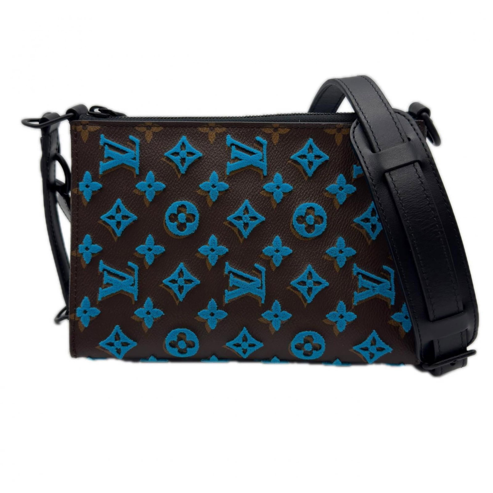 Canvas Leather coated shoulder bag from Louis Vuitton: Canvas Leather coated shoulder bag from Louis Vuitton Coated canvas and leather make up the exterior of this Louis Vuitton shoulder bag, available in beige, blue, and brown. The bag features a zipper