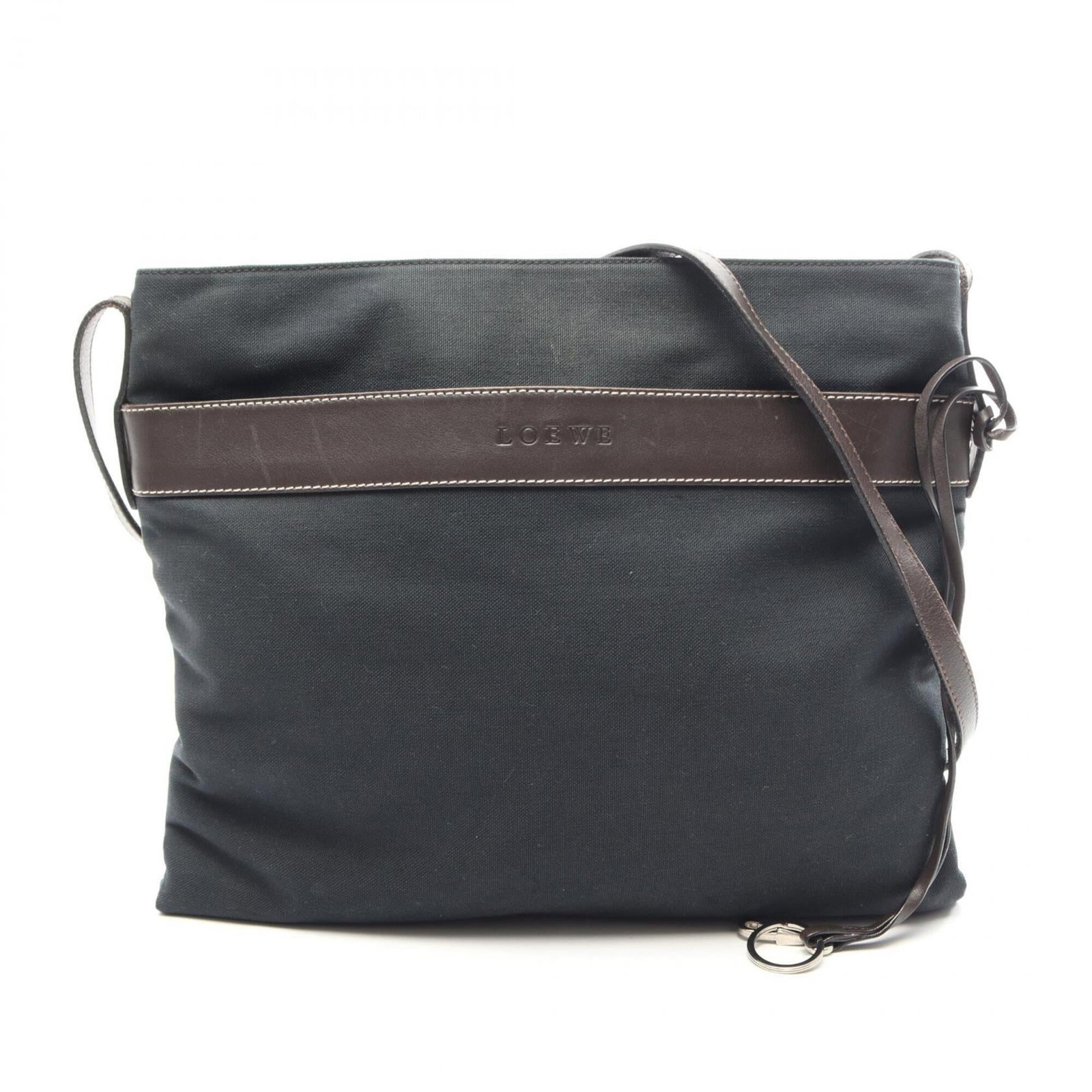 Canvas leather shoulder bag handbag by Loewe: Canvas leather shoulder bag handbag by Loewe Canvas leather shoulder bag by Loewe, featuring canvas and leather materials in brown and green hues. This stylish handbag measures 34cm x 39cm x 1cm and