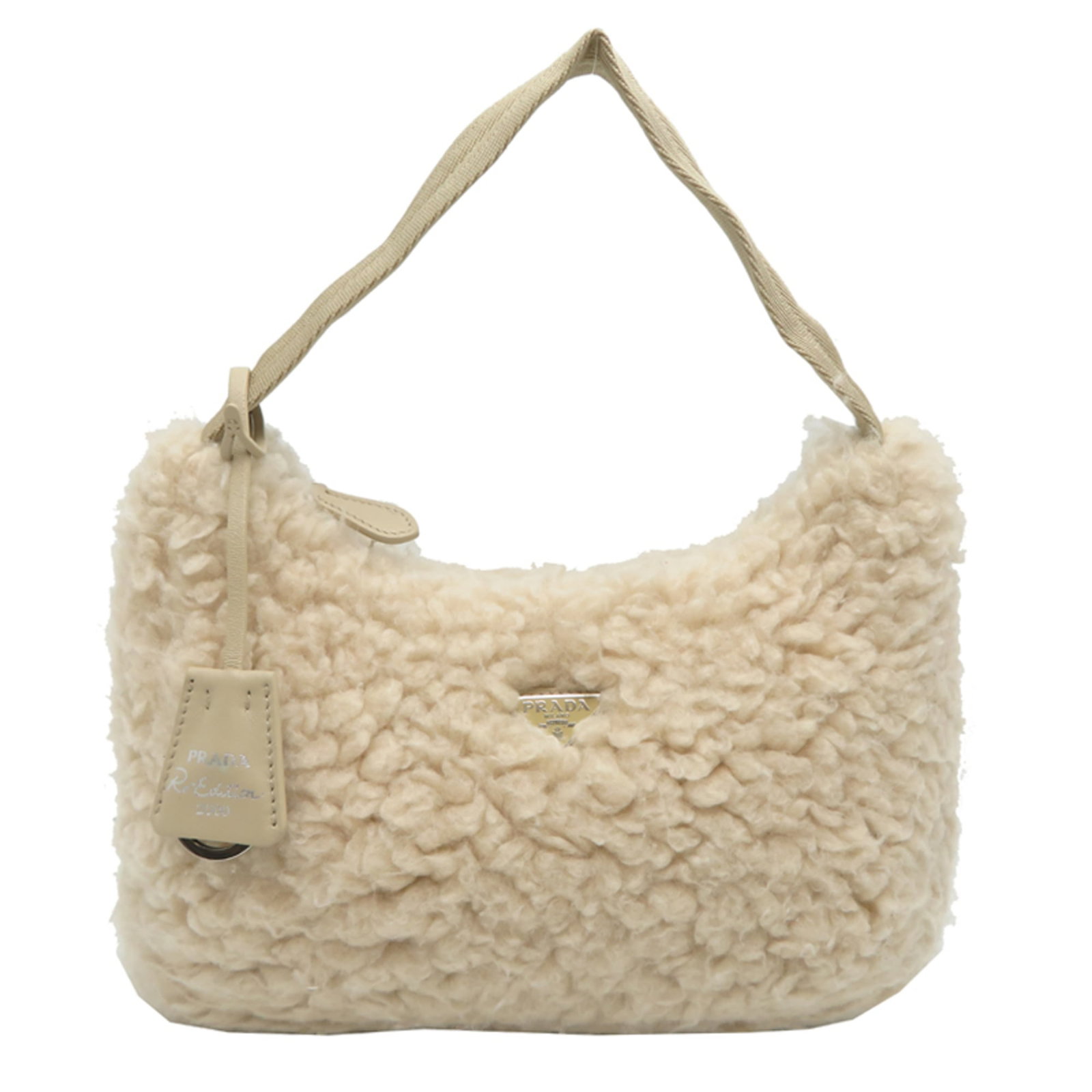 Handbag Silk Wool: Handbag Silk Wool Silk and wool blend in a crisp white hue, defining the Prada handbag's sleek silhouette. The structured design measures 17cm x 22cm x 7cm, while the handle stretches 31cm from the
