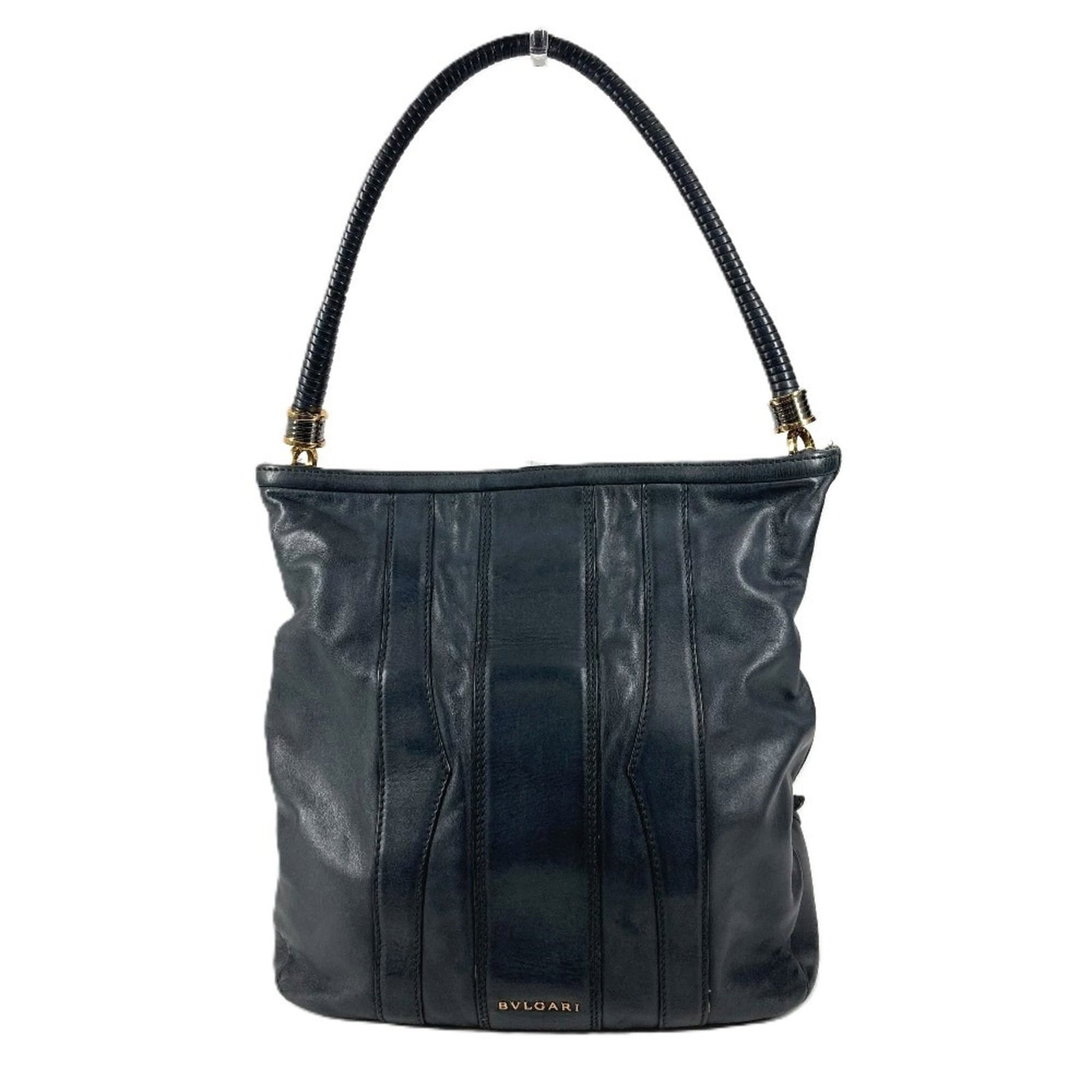 Bag Leather Tote Bvlgari Shoulder: Bag Leather Tote Bvlgari Shoulder Bvlgari's iconic B.zero1 line brings sleek sophistication to this navy leather tote bag, featuring a shoulder strap and dimensions perfect for everyday use. Made