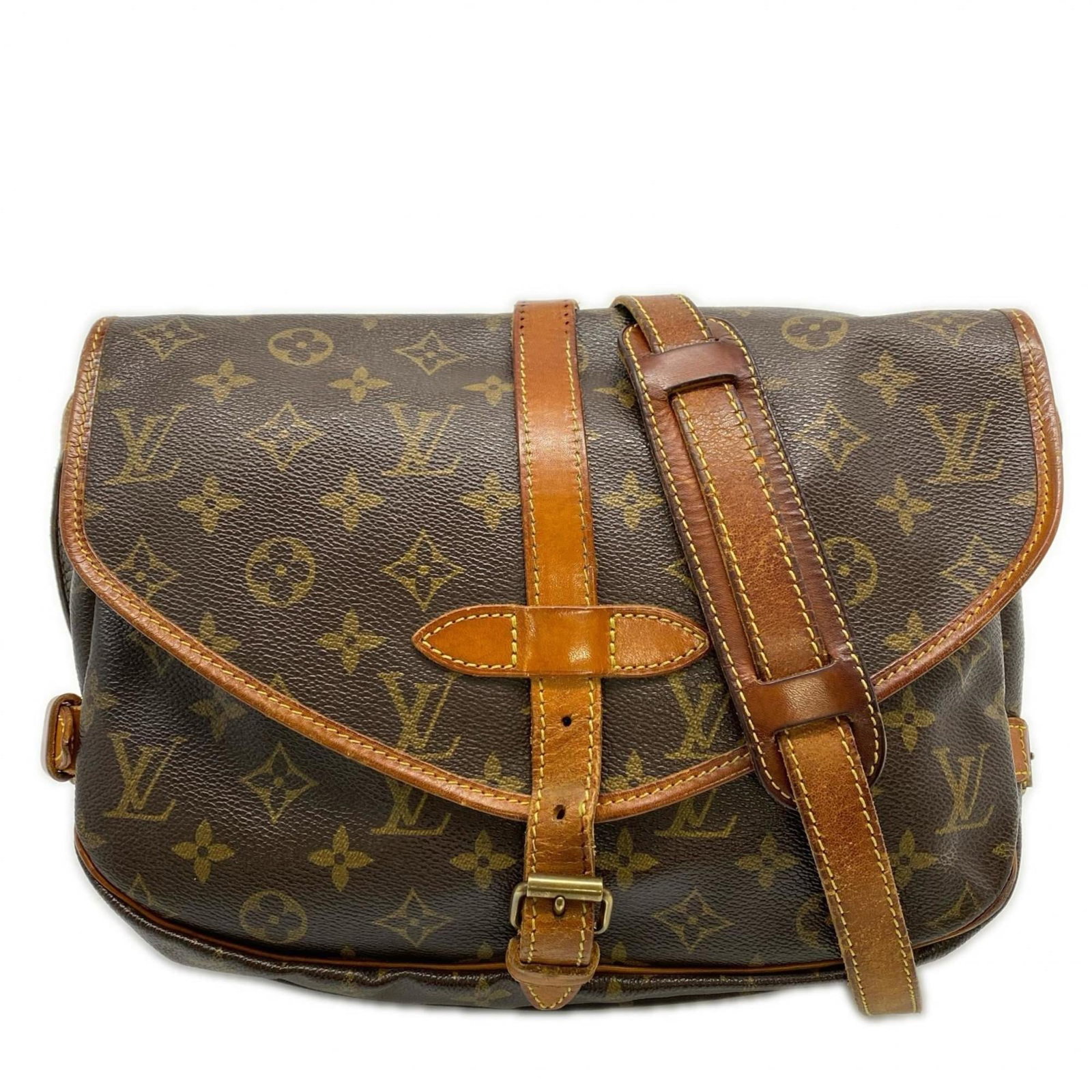 Canvas Leather coated shoulder bag from Louis Vuitton: Canvas Leather coated shoulder bag from Louis Vuitton Coated canvas and leather come together in classic Louis Vuitton design, with a timeless brown color and signature monogram pattern. This shoulder