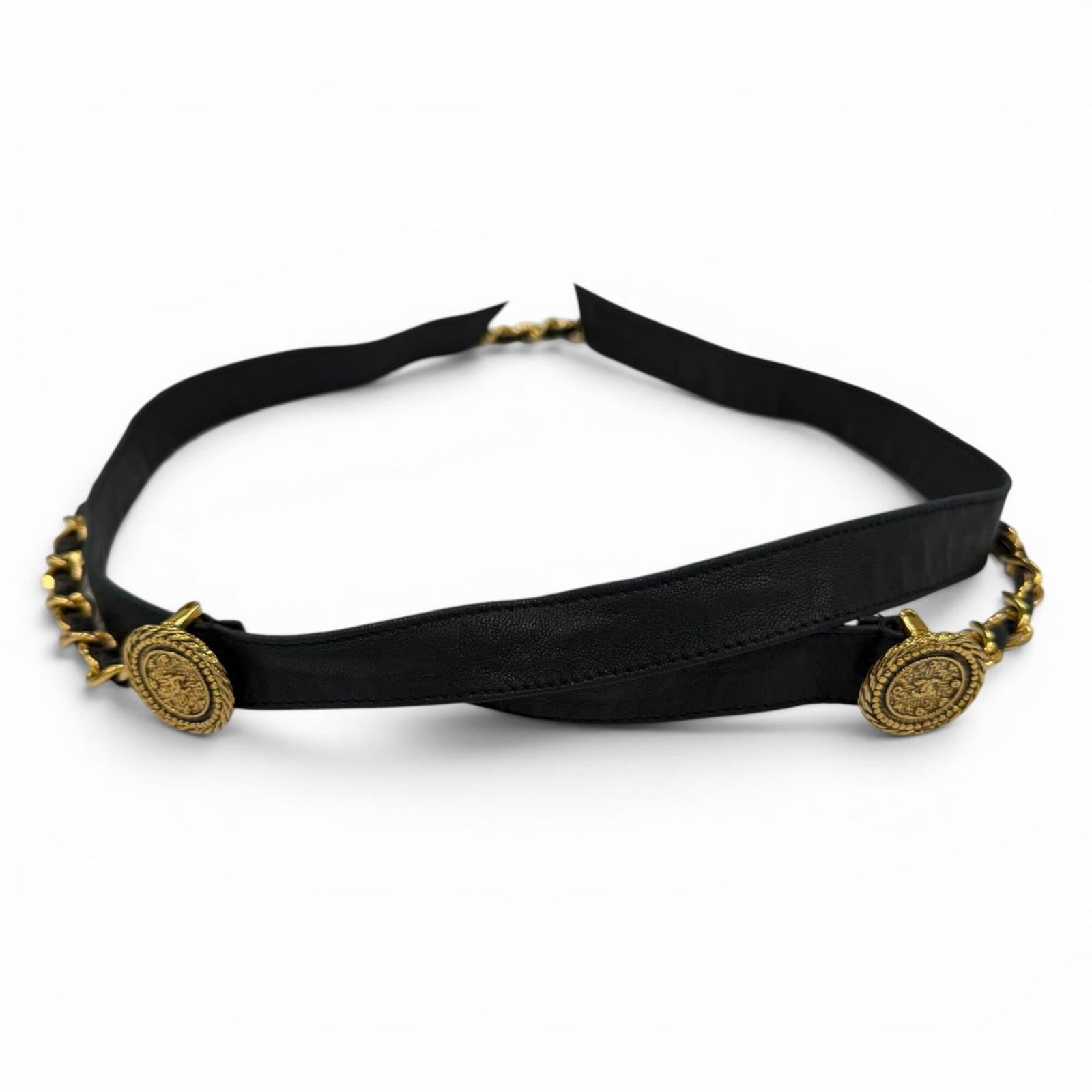 Chanel Ribbon Belt: Chanel Ribbon Belt Black leather ribbon belt with a classic design. Made by Chanel, this belt features a simple yet elegant style. Measuring 139cm in length, it adds a touch of sophistication to any