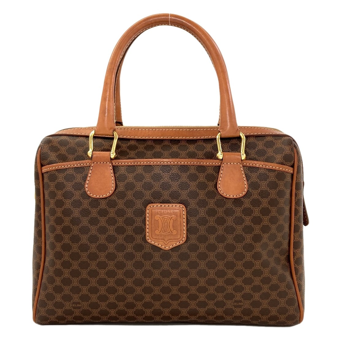 Handbag Celine Macadam Pvc: Handbag Celine Macadam Pvc Brown Celine Macadam PVC Handbag. This handbag features a sturdy exterior made from high-quality PVC material and a classic brown color. With its sleek design, the Macadam