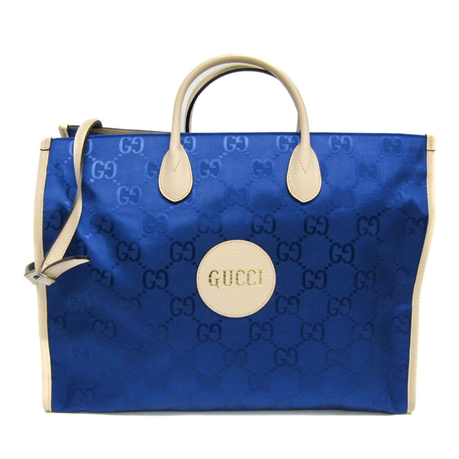 Nylon canvas handbag leather gucci bag shoulder: Nylon canvas handbag leather gucci bag shoulder Nylon canvas and leather Gucci bag, featuring the iconic Off the Grid GG design. This shoulder bag boasts a striking blue and off-white color combinatio