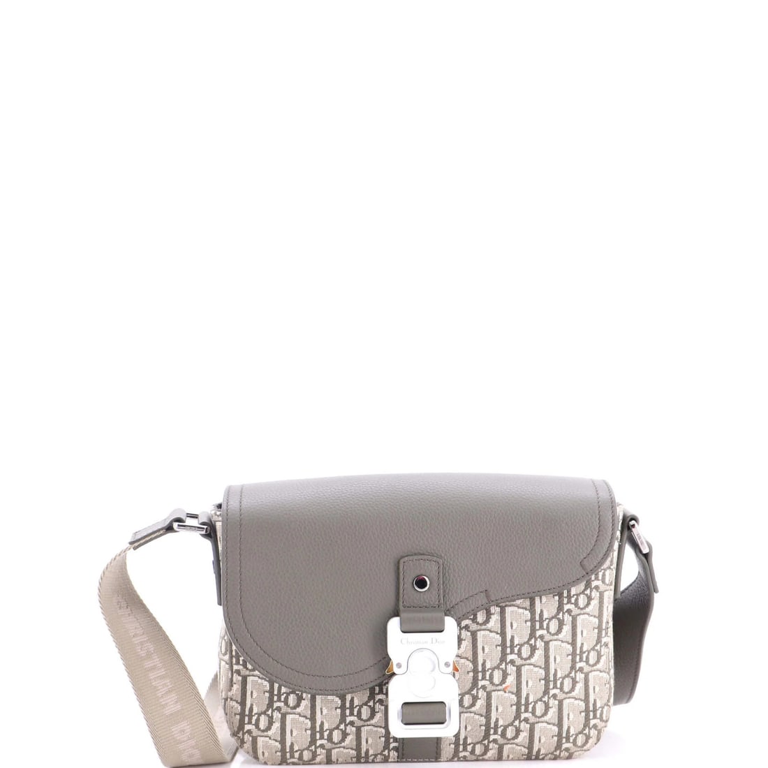 Christian Dior Saddle Canvas Leather Bag Messenger Small Flap Oblique Buckle: Christian Dior Saddle Canvas Leather Bag Messenger Small Flap Oblique Buckle The Christian Dior Saddle Canvas Leather Bag Messenger Small Flap Oblique Buckle boasts a striking green canvas exterior wi