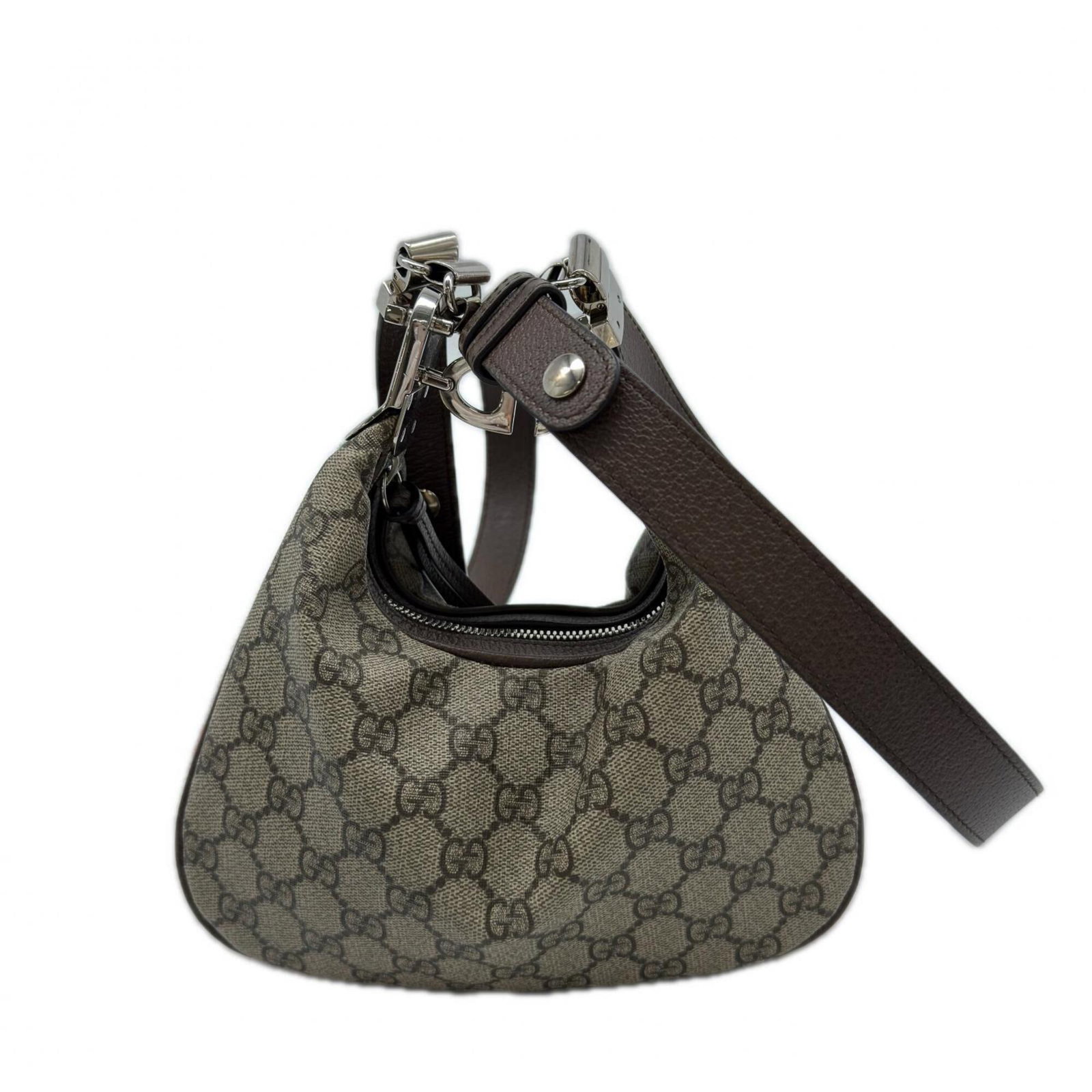 Handbag coated leather canvas shoulder bag Gucci: Handbag coated leather canvas shoulder bag Gucci Coated canvas and leather combine in this understated beige brown Gucci shoulder bag, measuring 13cm x 23cm x 4cm. The subtle design makes it a