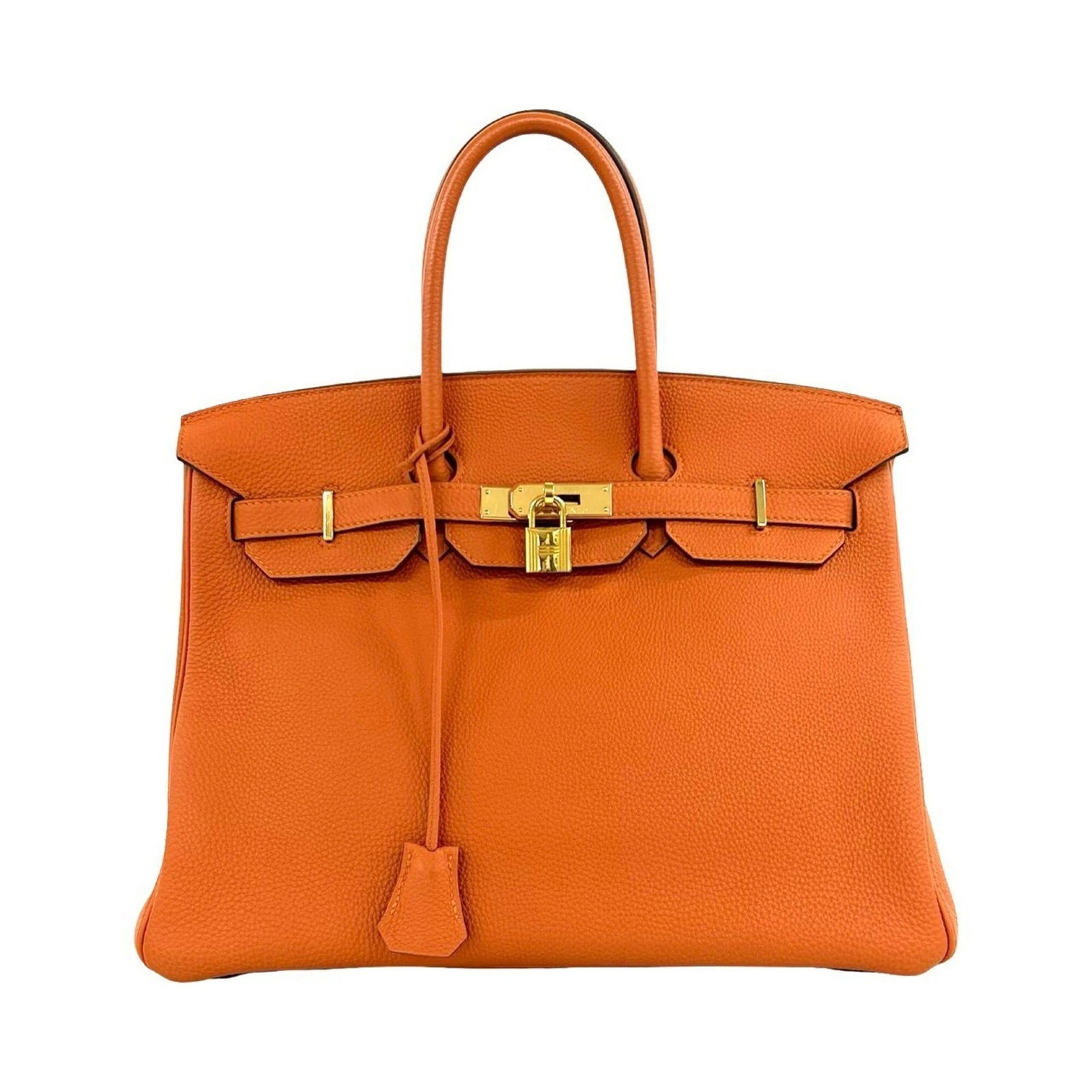 Hermes Handbag Tote Bag Taurillon Clemence Leather: Hermes Handbag Tote Bag Taurillon Clemence Leather The Hermes Taurillon Clemence Leather Handbag Tote Bag features vibrant orange color and high-quality Taurillon clemence leather construction.