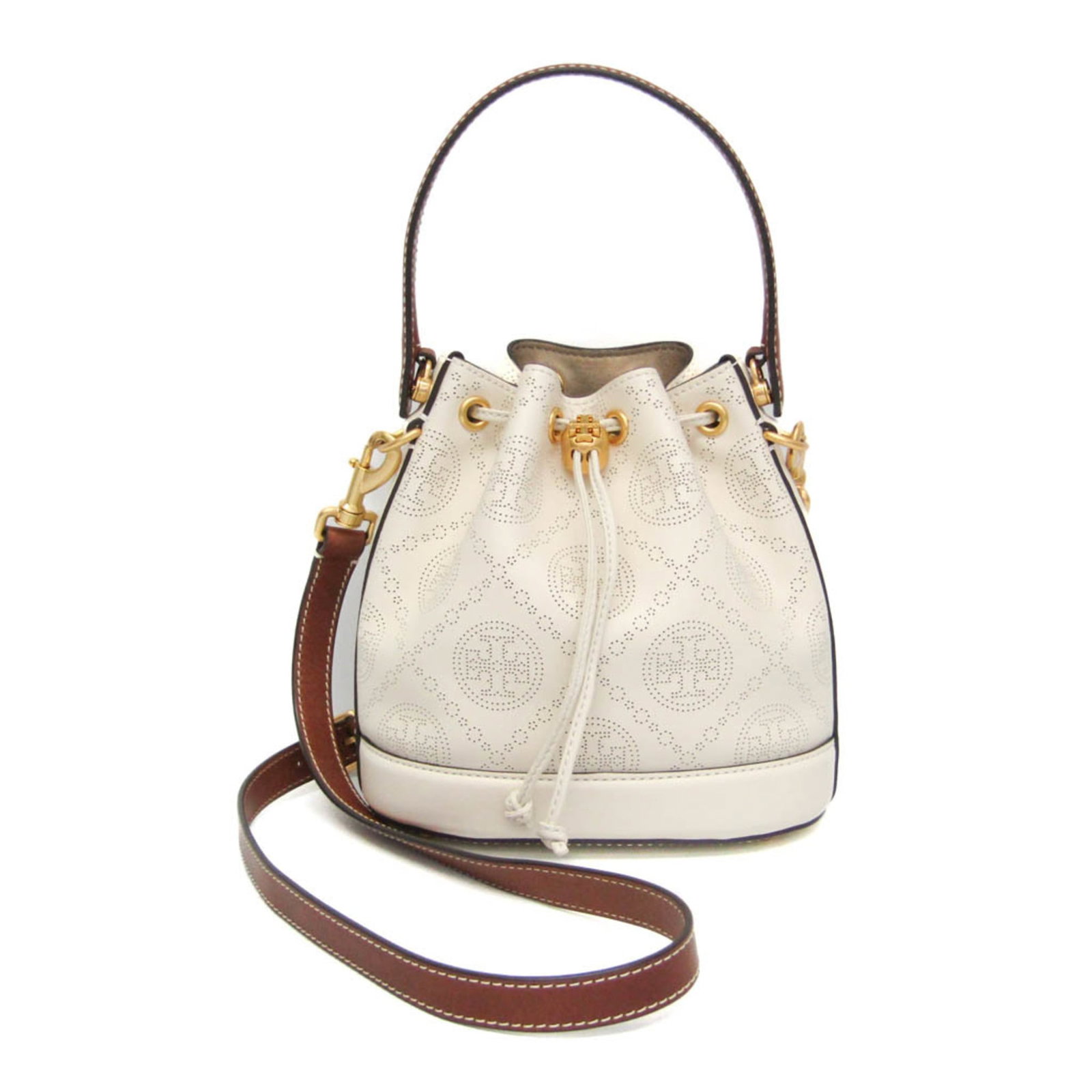 Tory Burch Handbag Shoulder Bag Leather: Tory Burch Handbag Shoulder Bag Leather The Tory Burch T Monogram Perforated Bucket Bag features a timeless design with a perforated monogram pattern in brown and off-white leather. This stylish