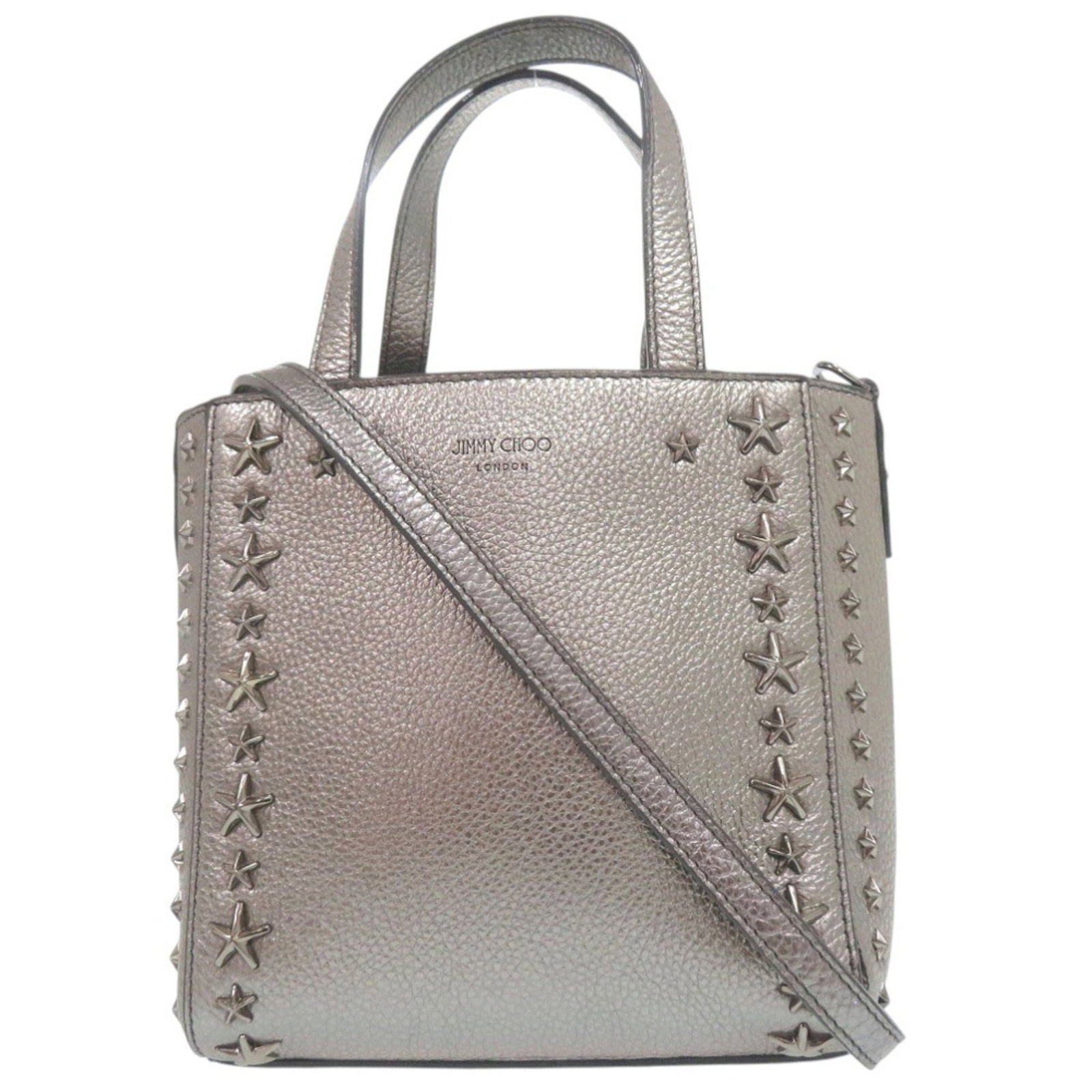 Handbag Leather By Jimmy: Handbag Leather By Jimmy Handbag Leather By Jimmy features Italian craftsmanship and sleek silver leather, with a shoulder strap for added convenience. Made from high-quality leather, this stylish