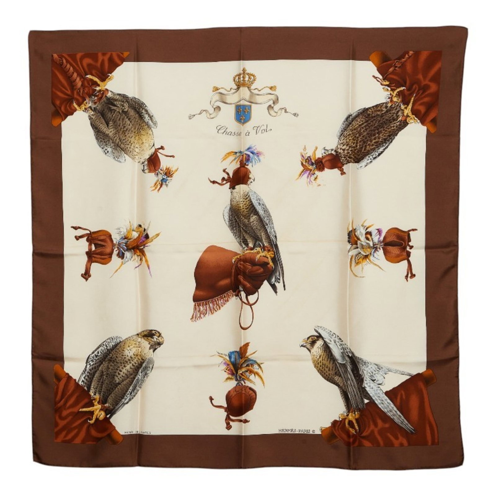 Hermes Silk Scarf: Hermes Silk Scarf Silk scarf from luxury brand Hermes, featuring a rich brown and ivory color combination. Made from high-quality silk with a size of 89cm x 88cm, this scarf offers a stylish addition 