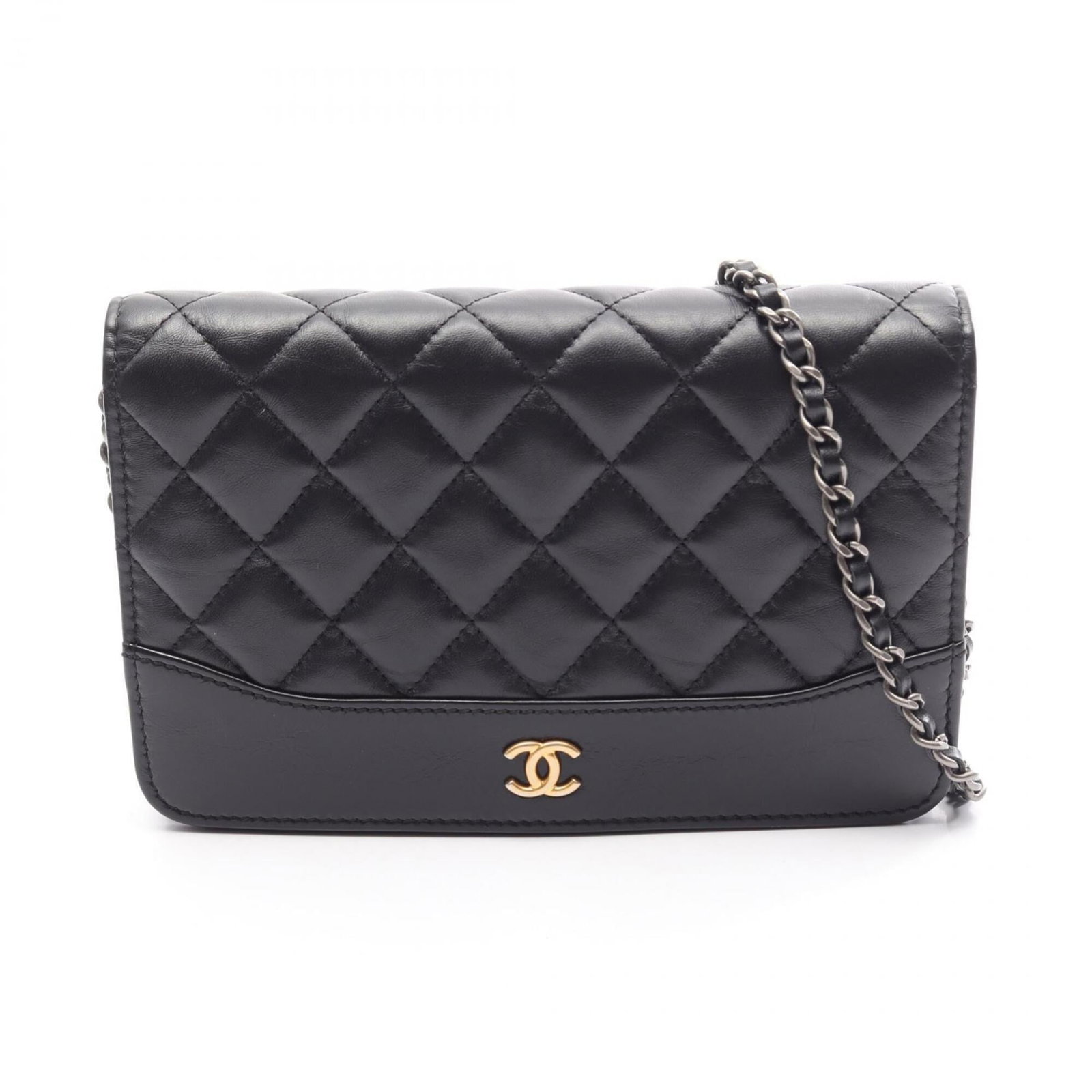 Chanel Handbag Shoulder Bag Leather: Chanel Handbag Shoulder Bag Leather Black leather shoulder bag from Chanel, featuring gold hardware and a sleek design. This compact bag measures 12cm x 19cm x 3cm and is perfect for everyday use. Its