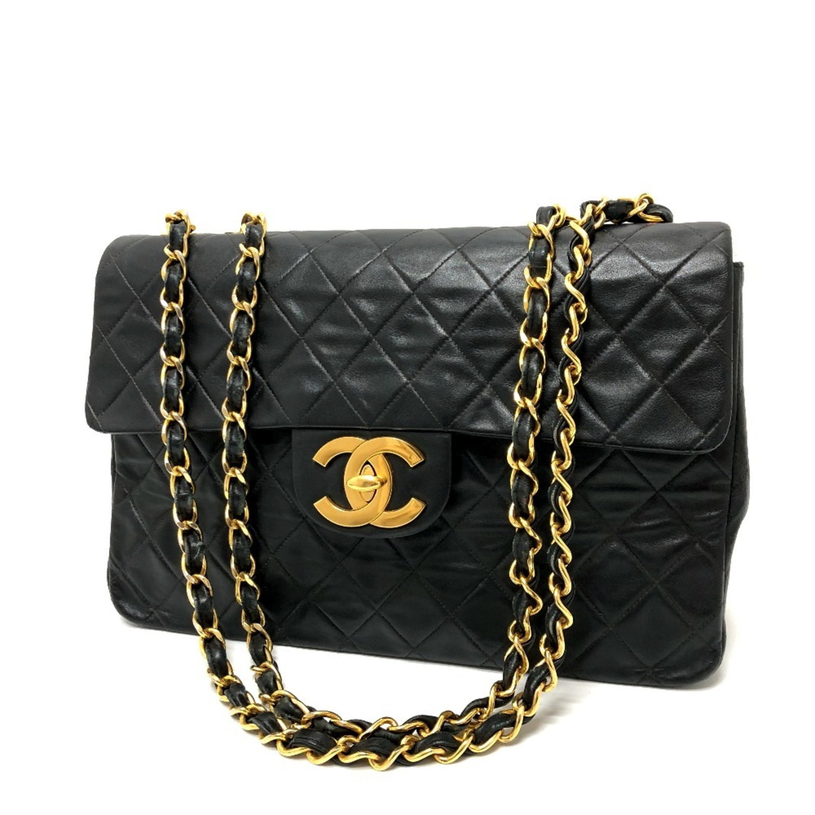 Shoulder Bag Leather Chanel: Shoulder Bag Leather Chanel Black leather shoulder bag from the iconic Chanel Matelasse line, featuring gold hardware and a classic turn lock closure. This stylish accessory measures 22cm x 33.5cm x 1