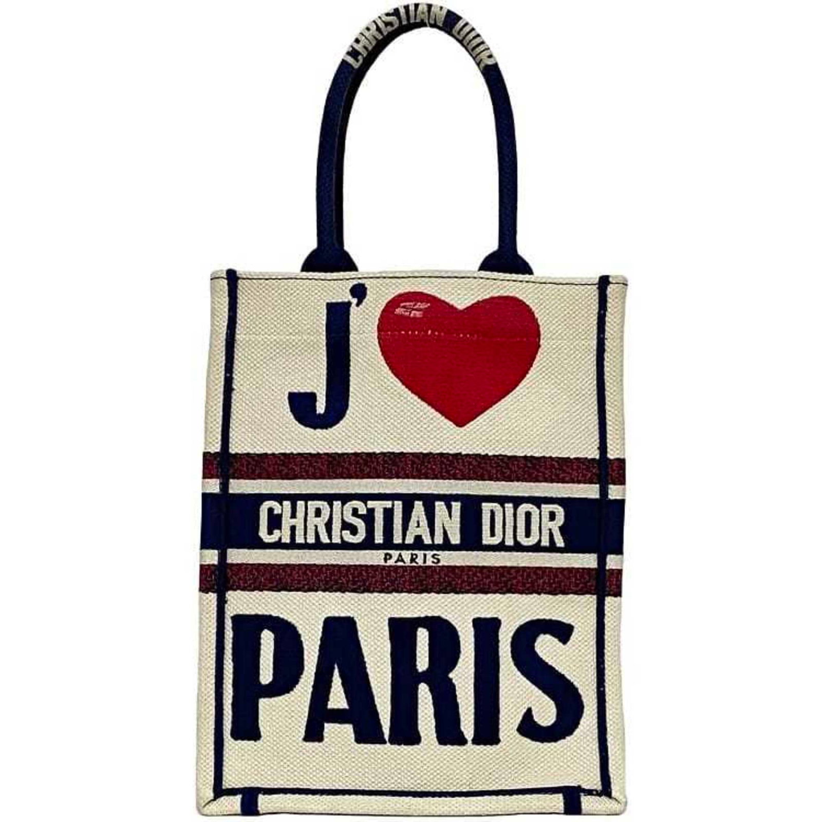 Canvas by Dior Christian: Canvas by Dior Christian Canvas by Dior Christian features a striking navy, red, and white color palette. The handbag's canvas material provides a unique texture, while its compact size makes it easy 