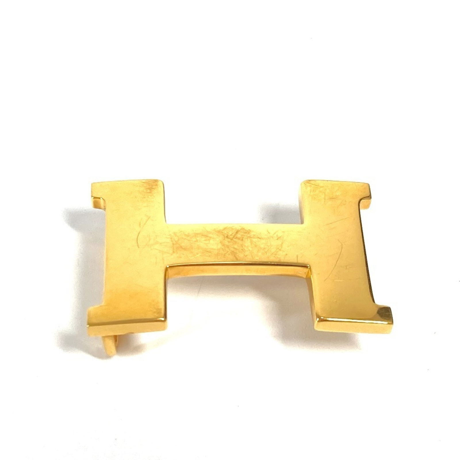 Hermes H Logo Buckle Only Belt Metal Men Women Gold: Hermes H Logo Buckle Only Belt Metal Men Women Gold Gold Hermes H Logo Buckle Only Belt Metal Men Women Accessory. A gold metal buckle featuring the iconic Hermes H logo, measuring 4.7cm in size.