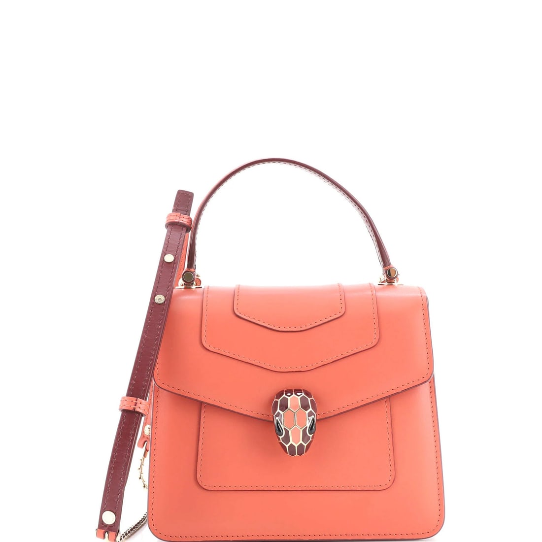 Serpenti Forever Bvlgari Leather Top Small Handle Bag: Serpenti Forever Bvlgari Leather Top Small Handle Bag Serpenti Forever Bvlgari Leather Top Small Handle Bag features a striking burgundy exterior with gold hardware, paired with a pink interior. The b