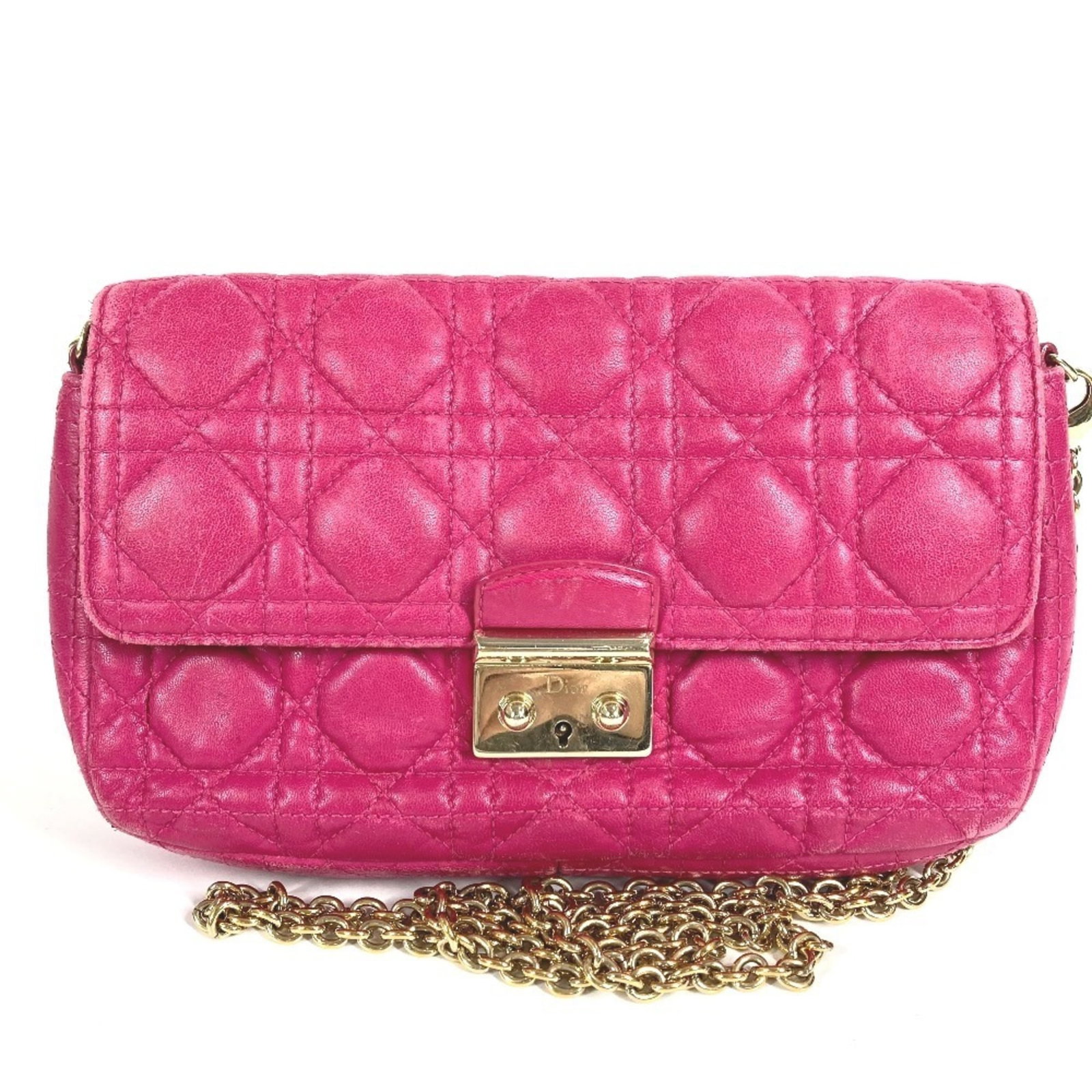 Shoulder bag of leather by Christian Dior: Shoulder bag of leather by Christian Dior Pink leather shoulder bag by Christian Dior, measuring 12.5cm x 21cm x 4cm, features a classic design with clean lines and minimal accessories. The bag's