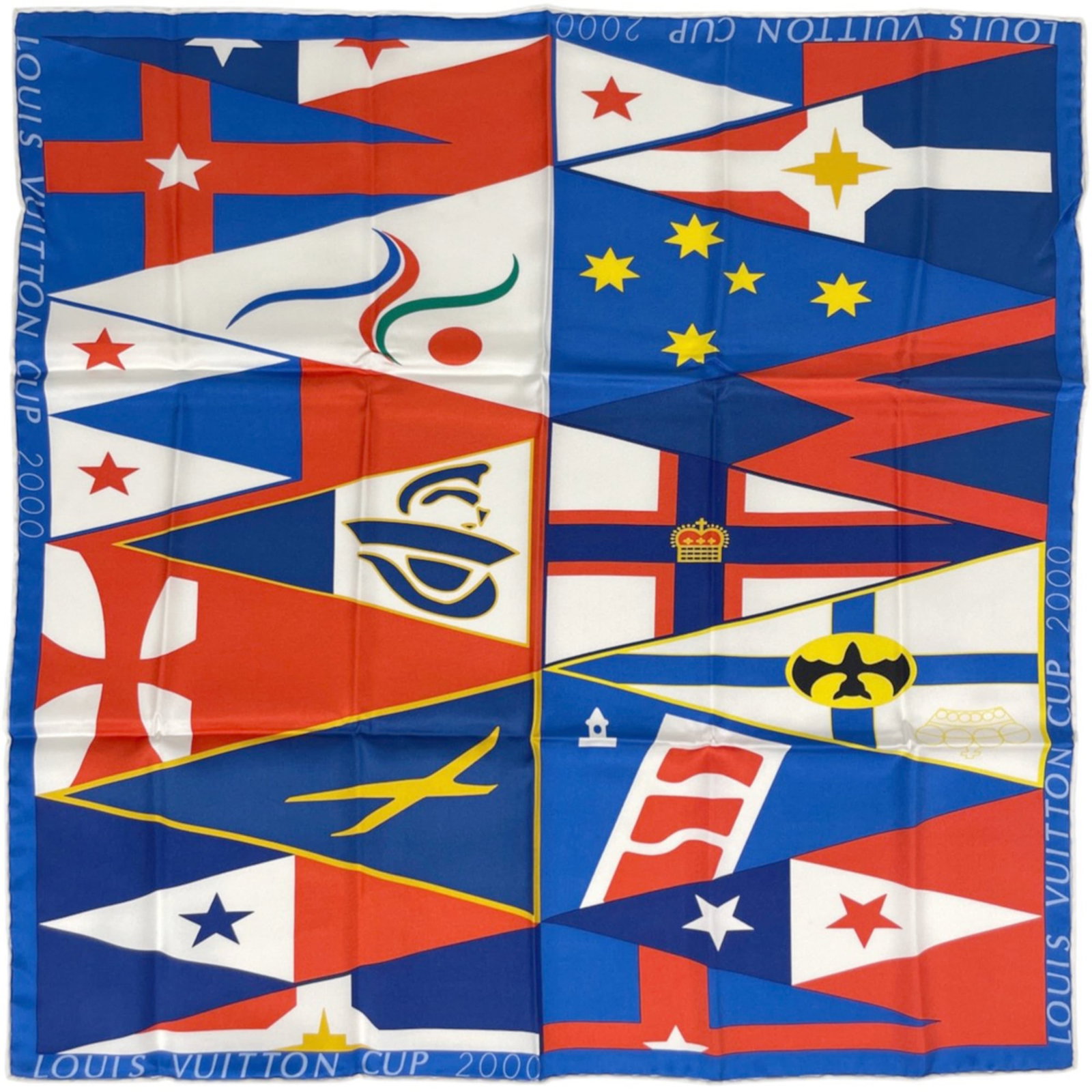 Silk scarf from Louis Vuitton: Silk scarf from Louis Vuitton Silk scarf from Louis Vuitton, featuring a vibrant blue and red color combination. Made from high-quality silk, this 55cm x 55cm square scarf offers a stylish accessory f