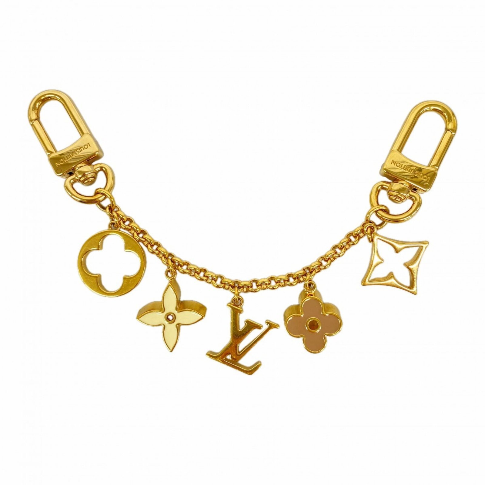 Louis Vuitton Keyring: Louis Vuitton Keyring The Louis Vuitton keyring boasts a sleek, gold finish and a classic design that adds a touch of sophistication to any outfit. Made from high-quality materials, its compact size m