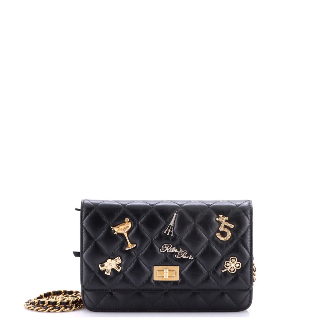 Chanel Lucky Charms Reissue 2.55 Wallet on Chain Quilted Calfskin: Chanel Lucky Charms Reissue 2.55 Wallet on Chain Quilted Calfskin Black quilted calfskin exterior, minor scuffs and creases, with burgundy leather interior and aged gold hardware. The cross body desig