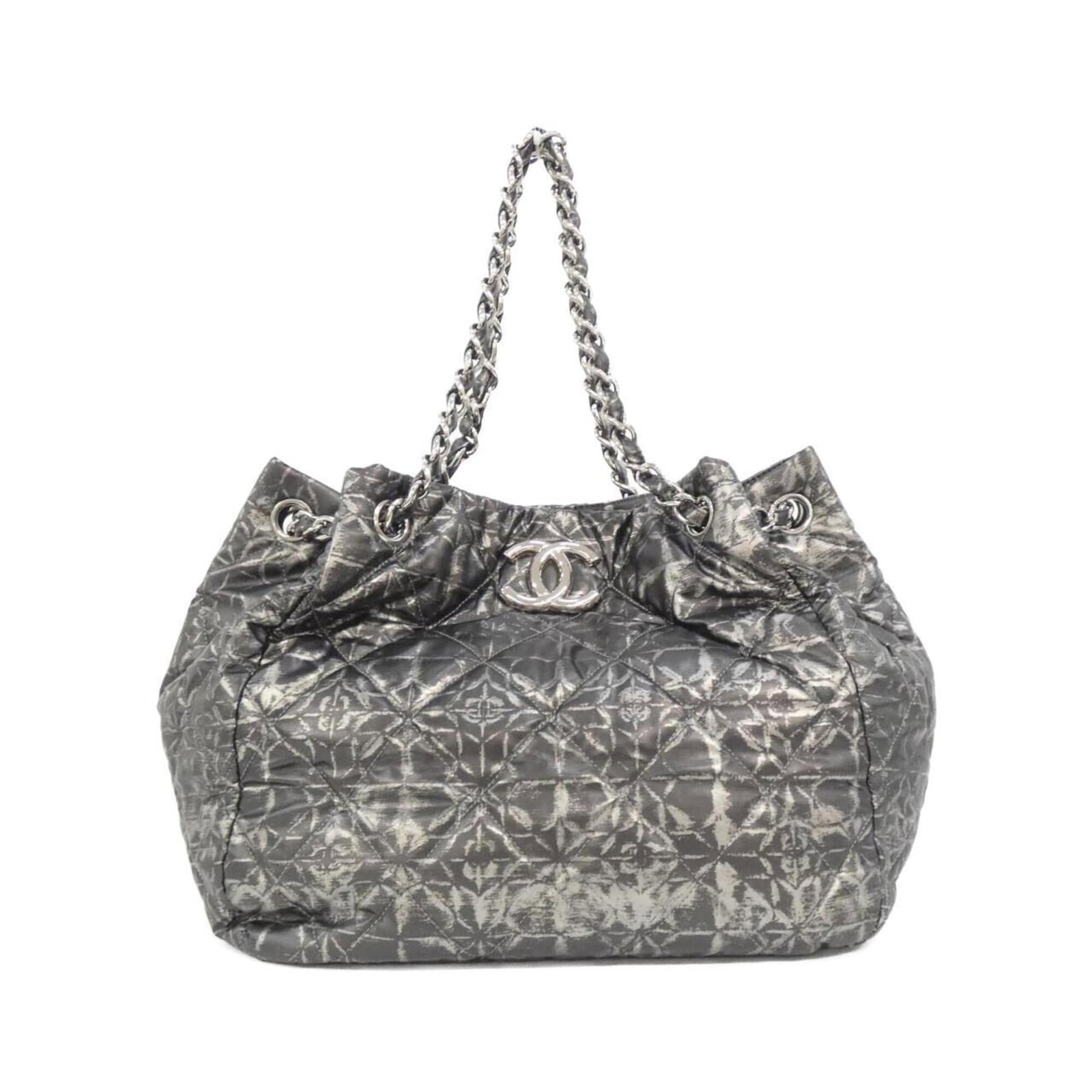 Polyester Handbag Chanel: Polyester Handbag Chanel This polyester handbag features the iconic Chanel design, with its sleek black and silver color combination. Measuring 23.5cm x 27cm x 17cm, it offers a compact yet stylish