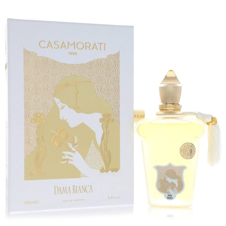 Dama Bianca by Xerjoff Eau De Parfum Spray 3.4 oz: Dama Bianca by Xerjoff Eau De Parfum Spray 3.4 oz Dama Bianca by Xerjoff Eau De Parfum Spray offers a unique blend of fruity and floral notes, featuring lime and kumquat as its opening scents. The hea