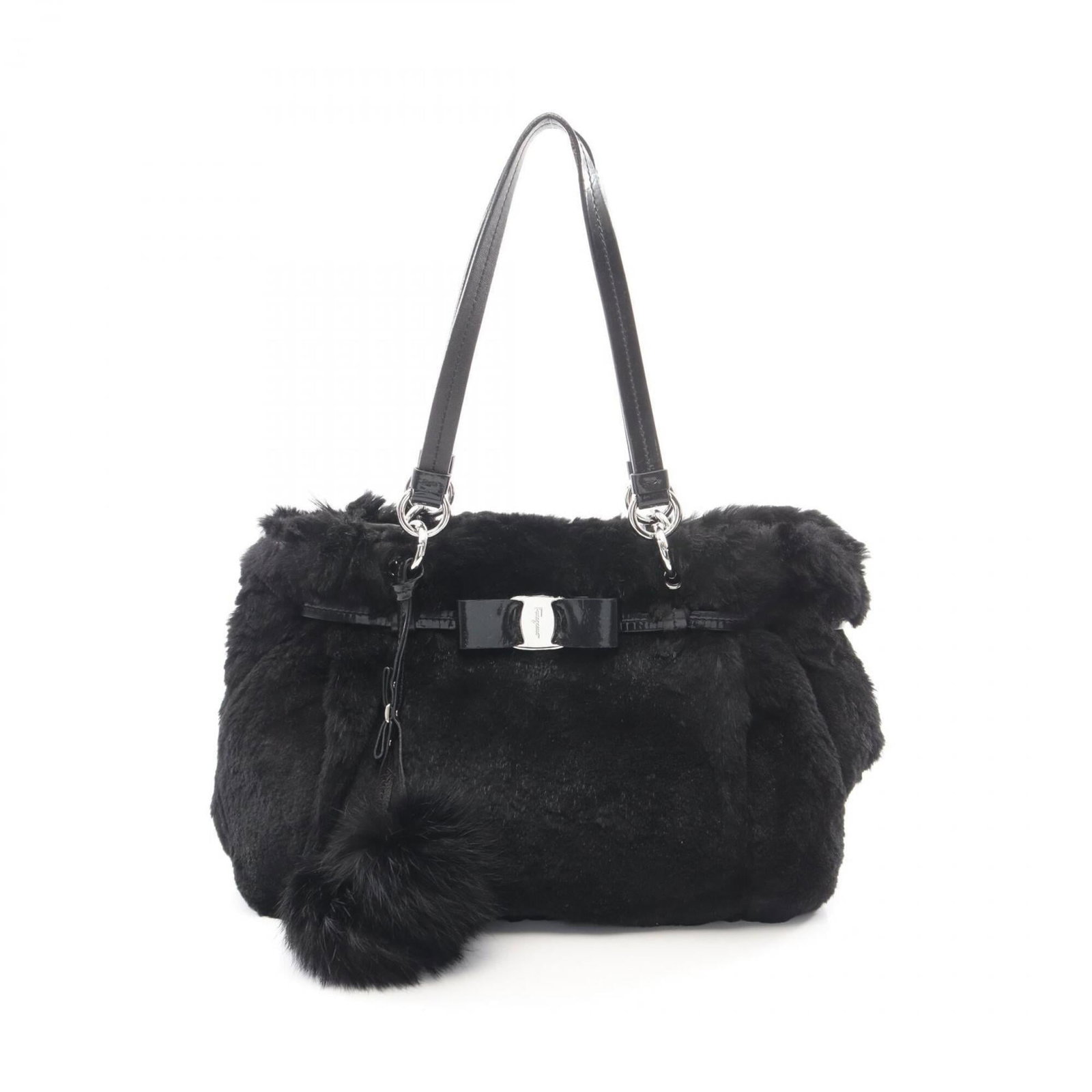 Salvatore Ferragamo fur leather handbag: Salvatore Ferragamo fur leather handbag Salvatore Ferragamo's iconic fur leather handbag boasts sleek black design, expertly crafted from high-quality materials. Measuring 24cm x 30cm x 10cm, it offer