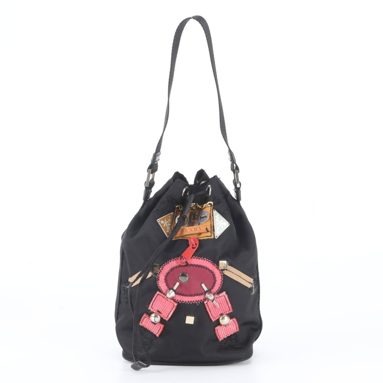 Nylon Leather Handbag Prada: Nylon Leather Handbag Prada Nylon and leather materials blend in this sleek, black Prada handbag. The bag's dimensions are compact, measuring 20cm x 14cm x 10cm, making it a versatile accessory for