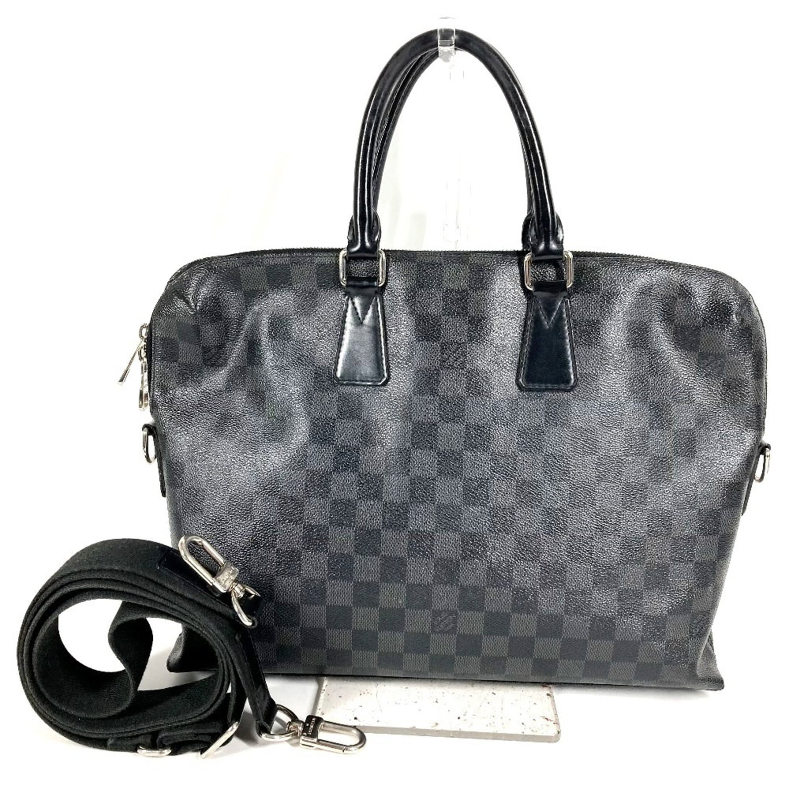 Louis Vuitton Briefcase Handbag Damier Graphite: Louis Vuitton Briefcase Handbag Damier Graphite Damier Graphite, the iconic Louis Vuitton pattern, adds a touch of sophistication to this sleek black briefcase handbag. Measuring 27.5cm x 36cm x 6cm,
