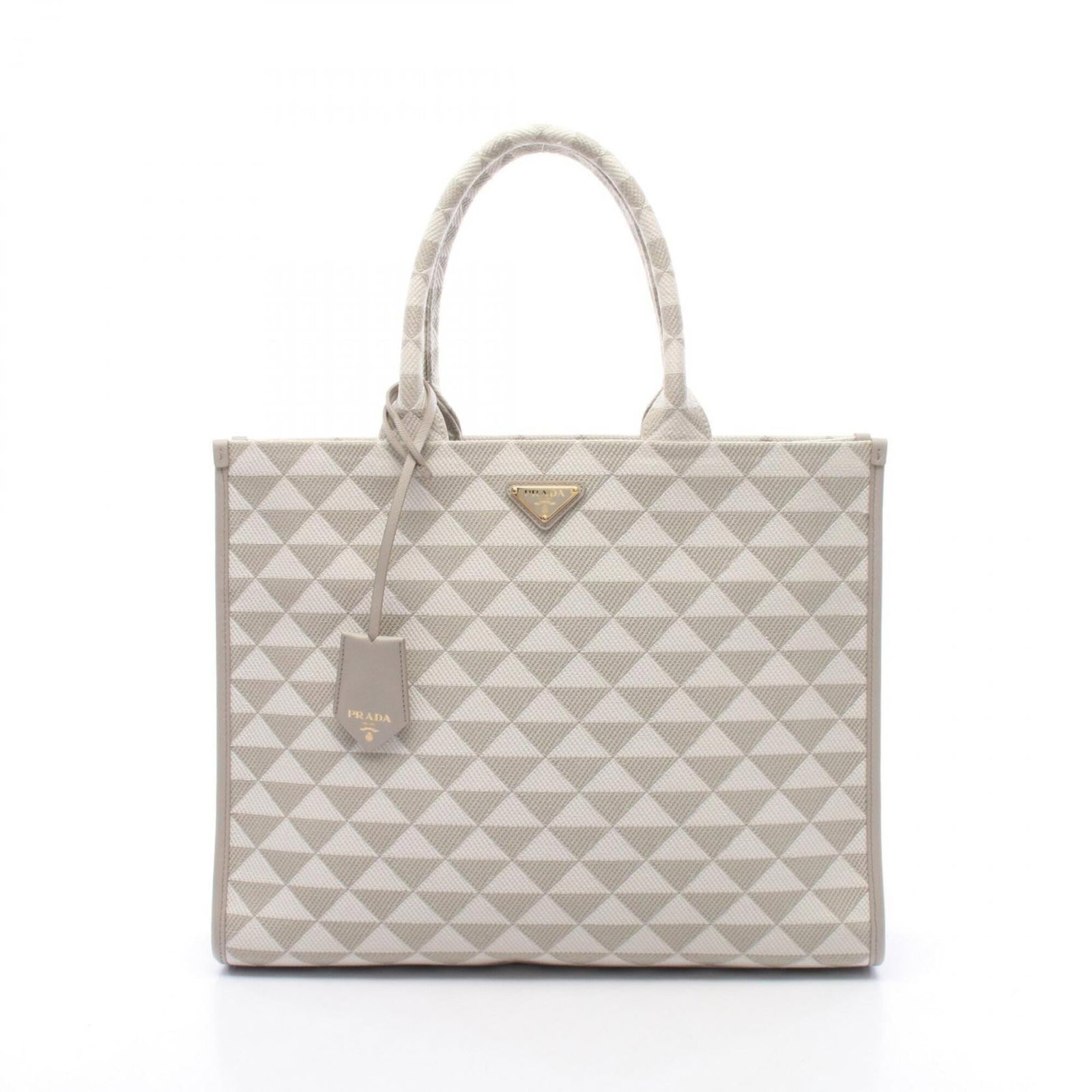 Canvas bag tote handbag by Prada: Canvas bag tote handbag by Prada Canvas bag tote handbag by Prada, featuring a classic gray and white color combination. This stylish tote measures 30cm x 39cm x 11cm and boasts a canvas material.