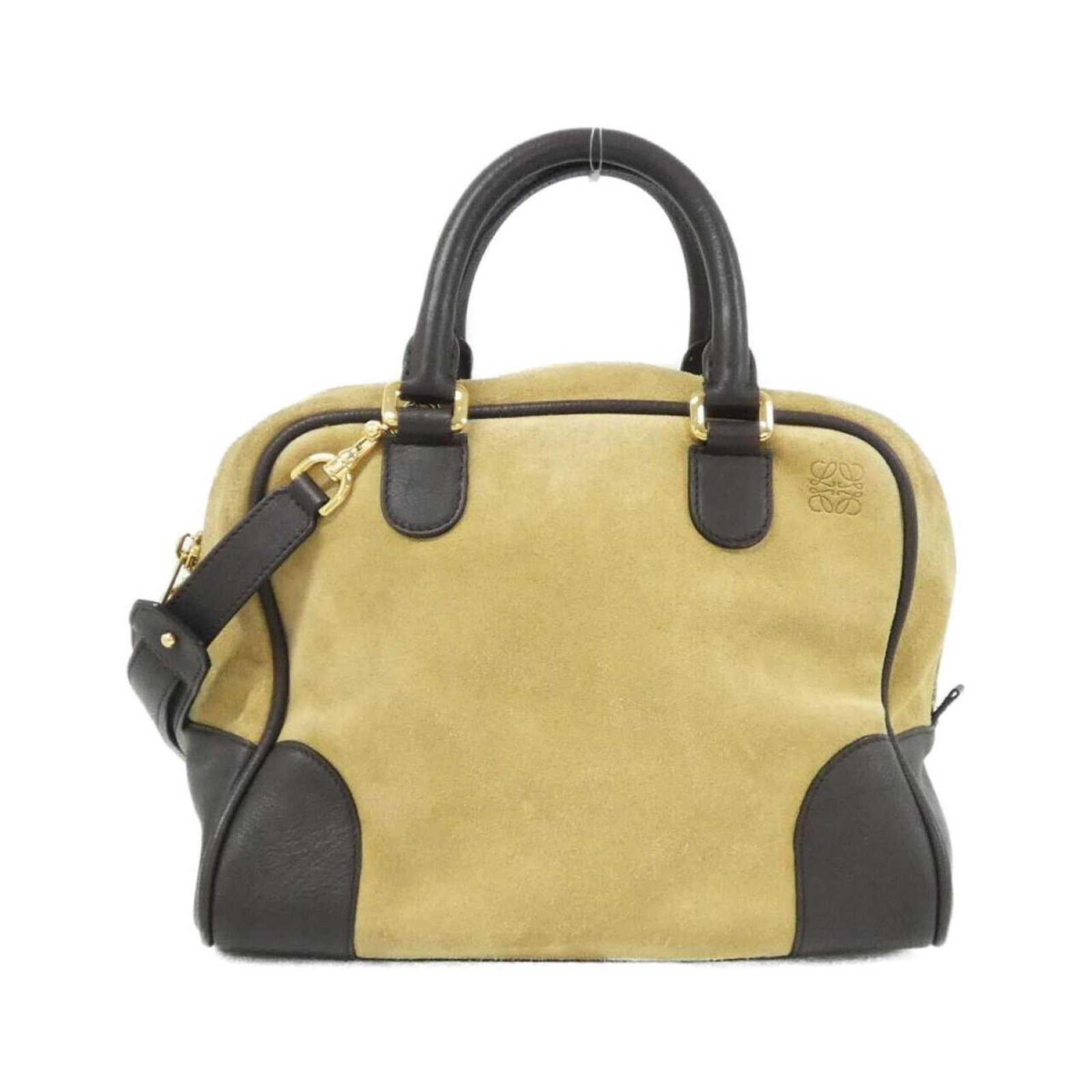 Handbag suede by Loewe: Handbag suede by Loewe Suede by Loewe, a luxurious handbag in rich brown and gold tones. The soft, supple suede material and elegant gold hardware add sophistication to this stylish accessory.