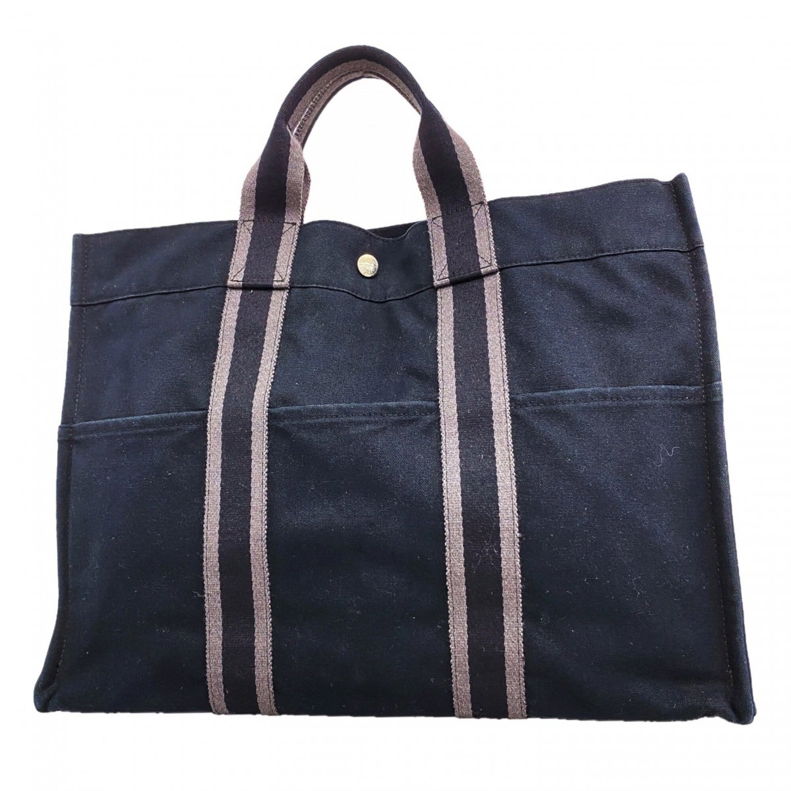 Canvas Hermes Tote Bag: Canvas Hermes Tote Bag Canvas tote bag from Hermes, featuring black canvas and silver hardware. Measuring 31.5cm x 43cm x 11cm, it boasts a classic design with clean lines. Made from high-quality