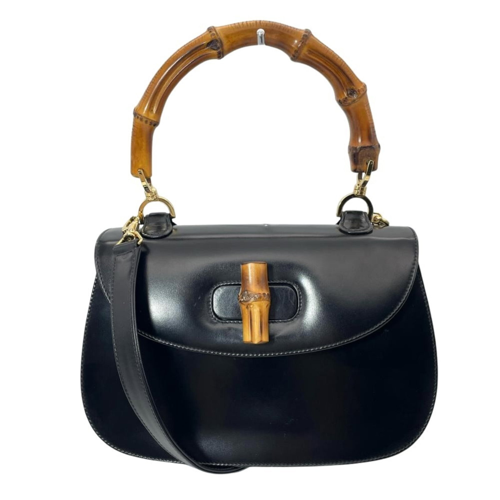 Gucci Handbag Leather: Gucci Handbag Leather Gucci Handbag Leather - A Timeless Italian Classic. This black leather handbag from Gucci features gold hardware and measures 16cm x 26cm x 6.5cm, making it a stylish and