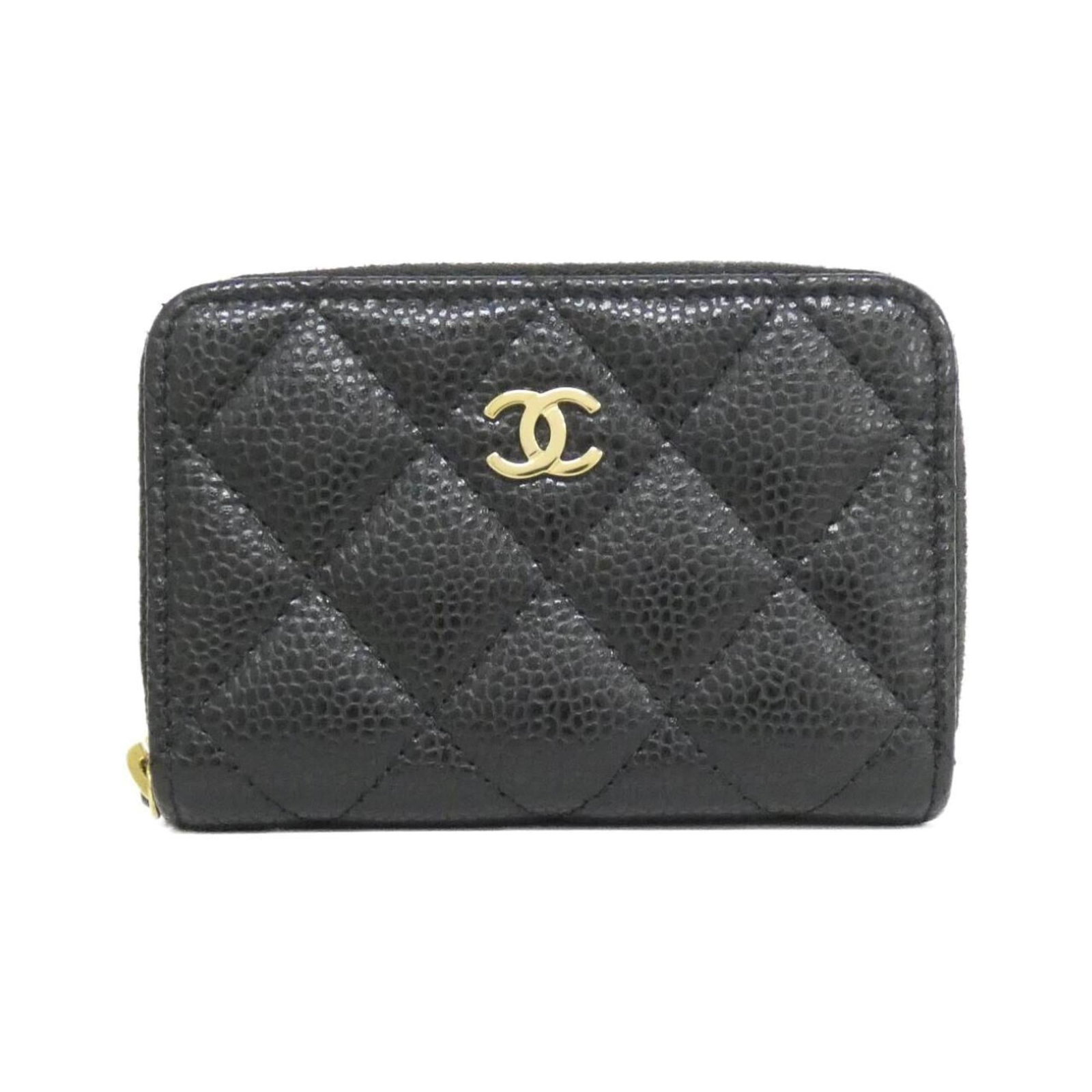 Chanel Coin Purse/ Coin Case Grained Calfskin: Chanel Coin Purse/ Coin Case Grained Calfskin The Chanel Coin Purse/ Coin Case Grained Calfskin is a sleek and sophisticated accessory, featuring a classic design with a signature black finish. Made f