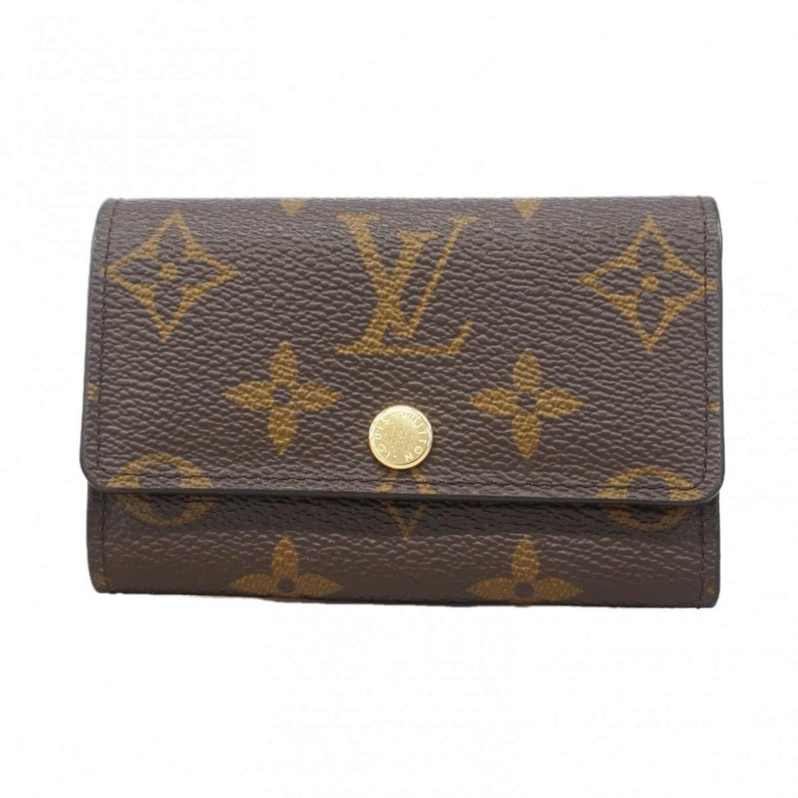 Keycase by Louis Vuitton: Keycase by Louis Vuitton Fuchsia-colored Keycase by Louis Vuitton, measuring 7cm x 10.5cm x 1.5cm, features a compact design perfect for everyday carry. This stylish accessory boasts a distinctive col