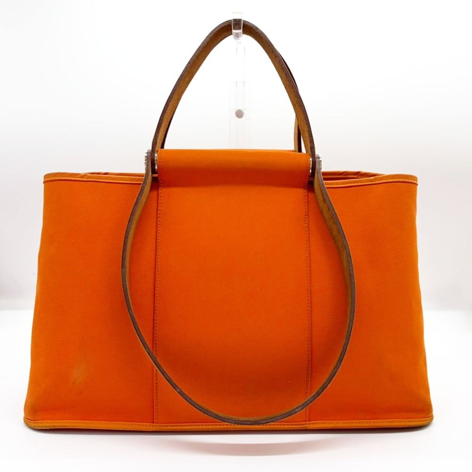 Officier Toile Bag Hermes Tote: Officier Toile Bag Hermes Tote Orange Toile Officier Hermes Tote Bag. This tote bag features iconic Herm?s Toile Officier design in vibrant orange, a classic and timeless choice. With its compact