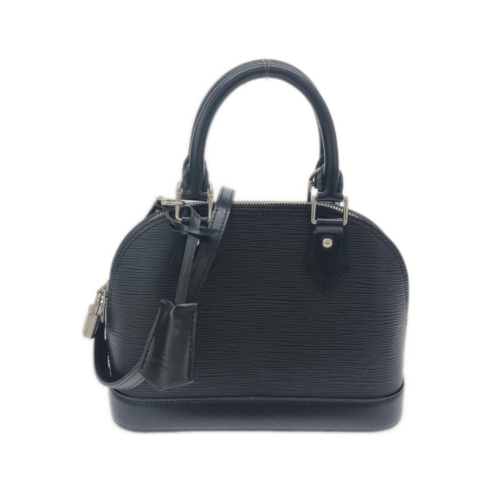 Louis Vuitton Handbag Leather: Louis Vuitton Handbag Leather Louis Vuitton Handbag Leather is made from high-quality Calfskin leather, available in Black. The bag measures 18cm x 23.5cm x 11.5cm and features a classic design. This 