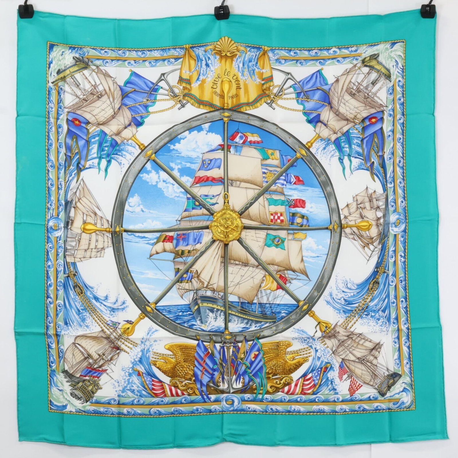 Hermes Silk Scarf: Hermes Silk Scarf Silk scarf from renowned luxury brand Hermes, featuring a vibrant green and multi-color design. Made from high-quality silk, this scarf measures 89cm x 89.5cm in size. Its unique