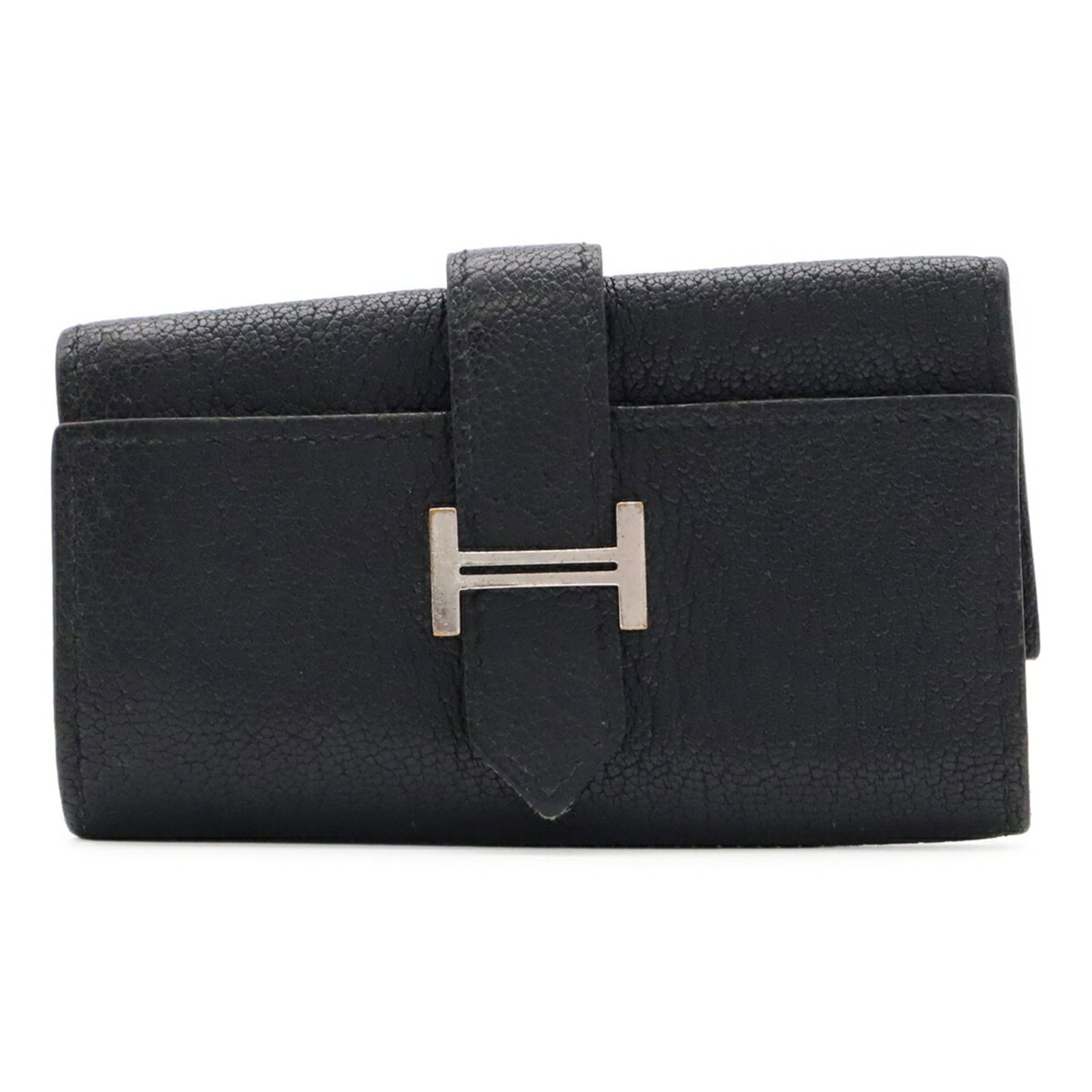 Chevre Leather Keycase By Hermes: Chevre Leather Keycase By Hermes Chevre leather provides a rich, supple texture to this sleek keycase by Hermes. The black finish adds a touch of sophistication, while the compact size makes it easy