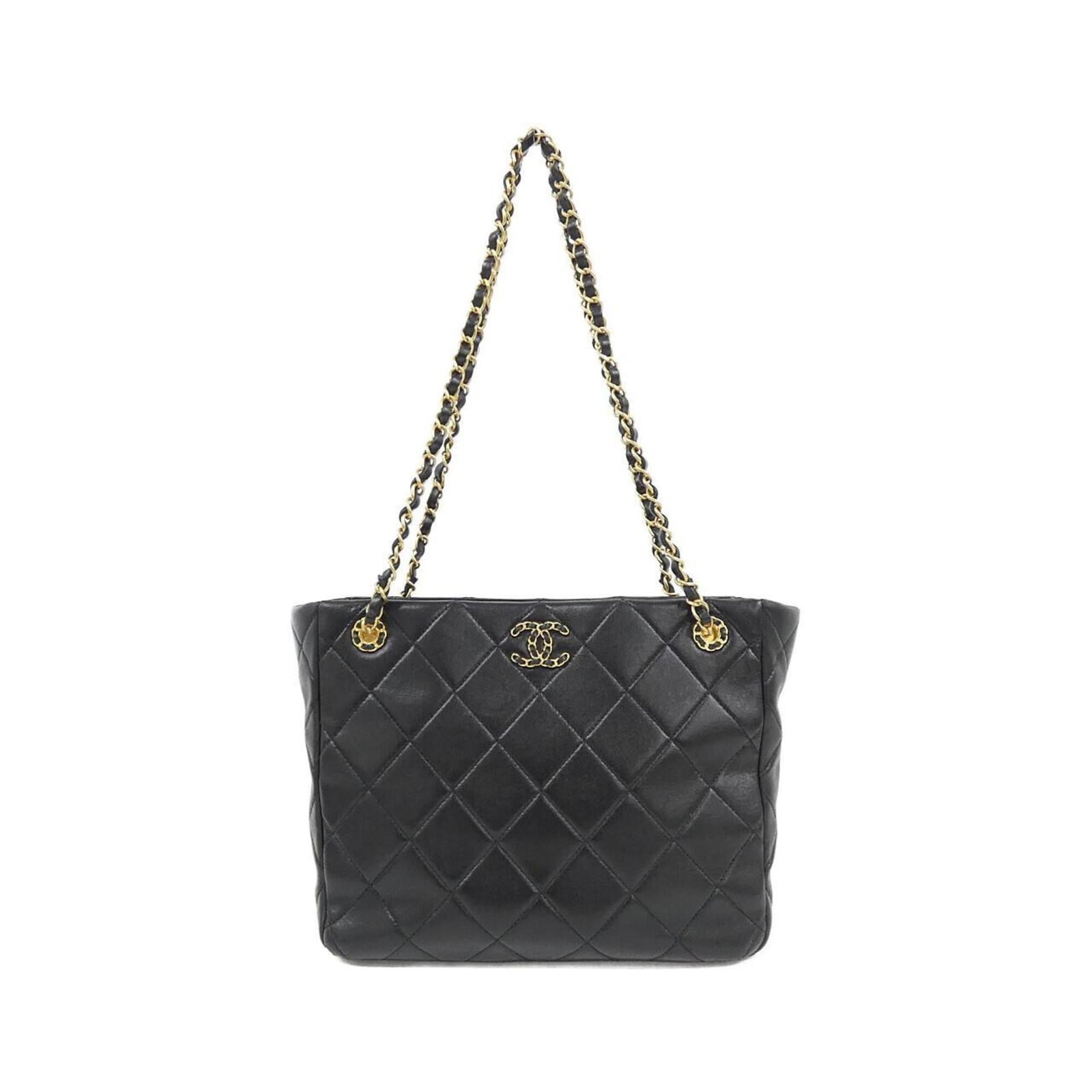 Leather Handbag Chanel: Leather Handbag Chanel This luxurious black lambskin leather handbag from Chanel boasts sleek dimensions and a sophisticated design, measuring 22cm x 34cm x 10cm. Crafted with premium materials, its