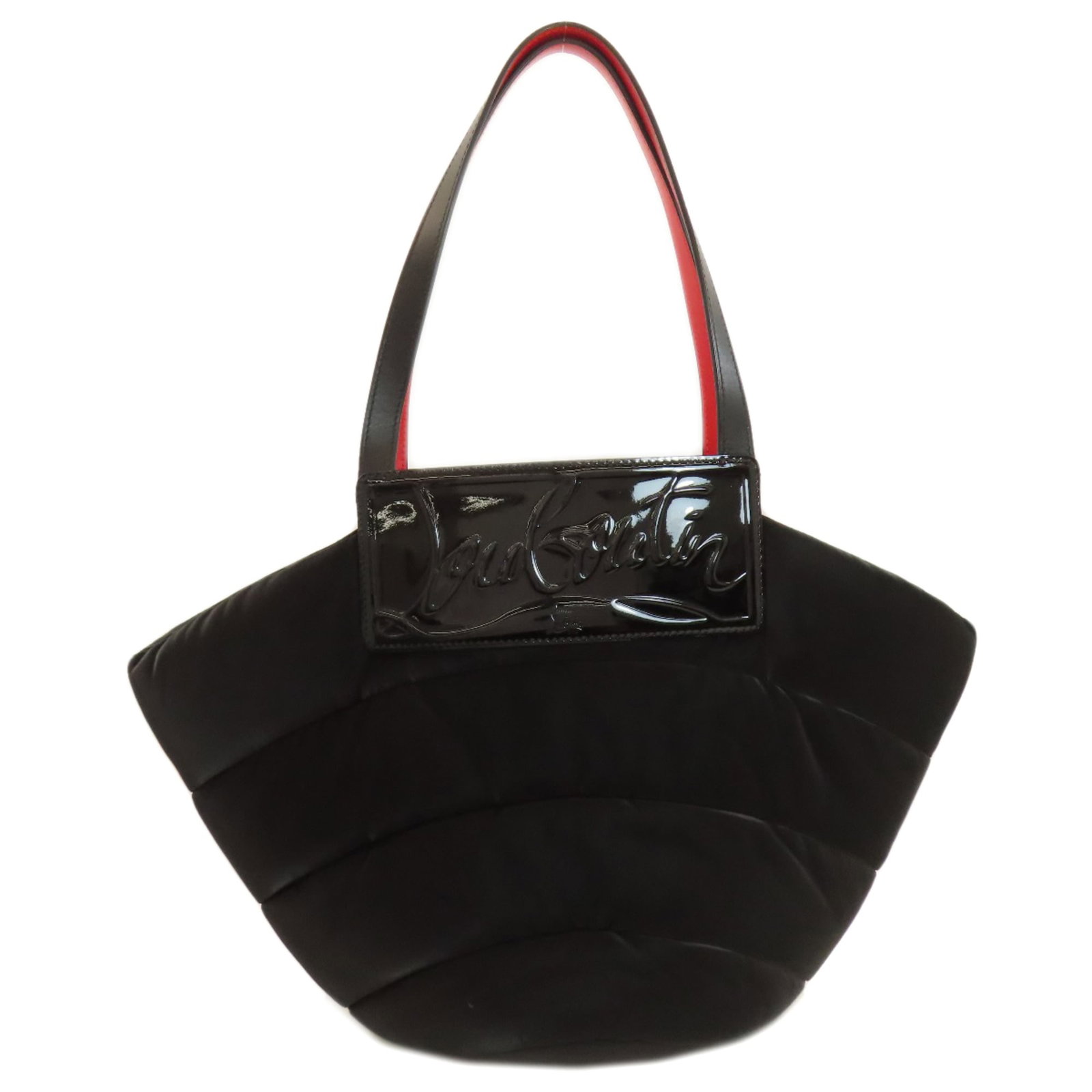 Nylon bag tote by Christian Louboutin: Nylon bag tote by Christian Louboutin Black nylon tote bag by Christian Louboutin, measuring 30cm x 49cm x 18cm. This stylish tote features a sleek design and durable nylon material. Signed with the b