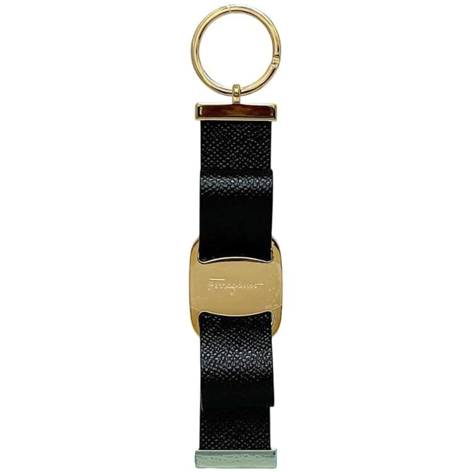 Salvatore Ferragamo Keyring Leather Metal: Salvatore Ferragamo Keyring Leather Metal Salvatore Ferragamo Keyring Leather Metal features a sleek black leather exterior and gold metal accents, showcasing the iconic Italian brand's signature styl