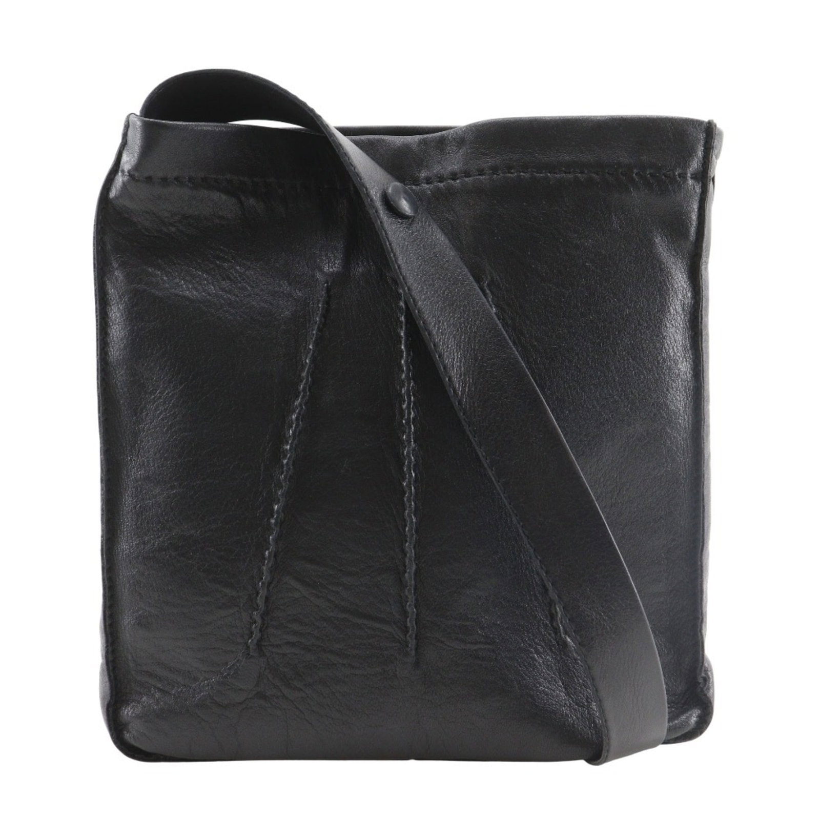 Shoulder bag leather by Hermes: Shoulder bag leather by Hermes This black leather shoulder bag from Hermes features high-quality calfskin material and a sleek, compact design. With its classic style and timeless appeal, it's