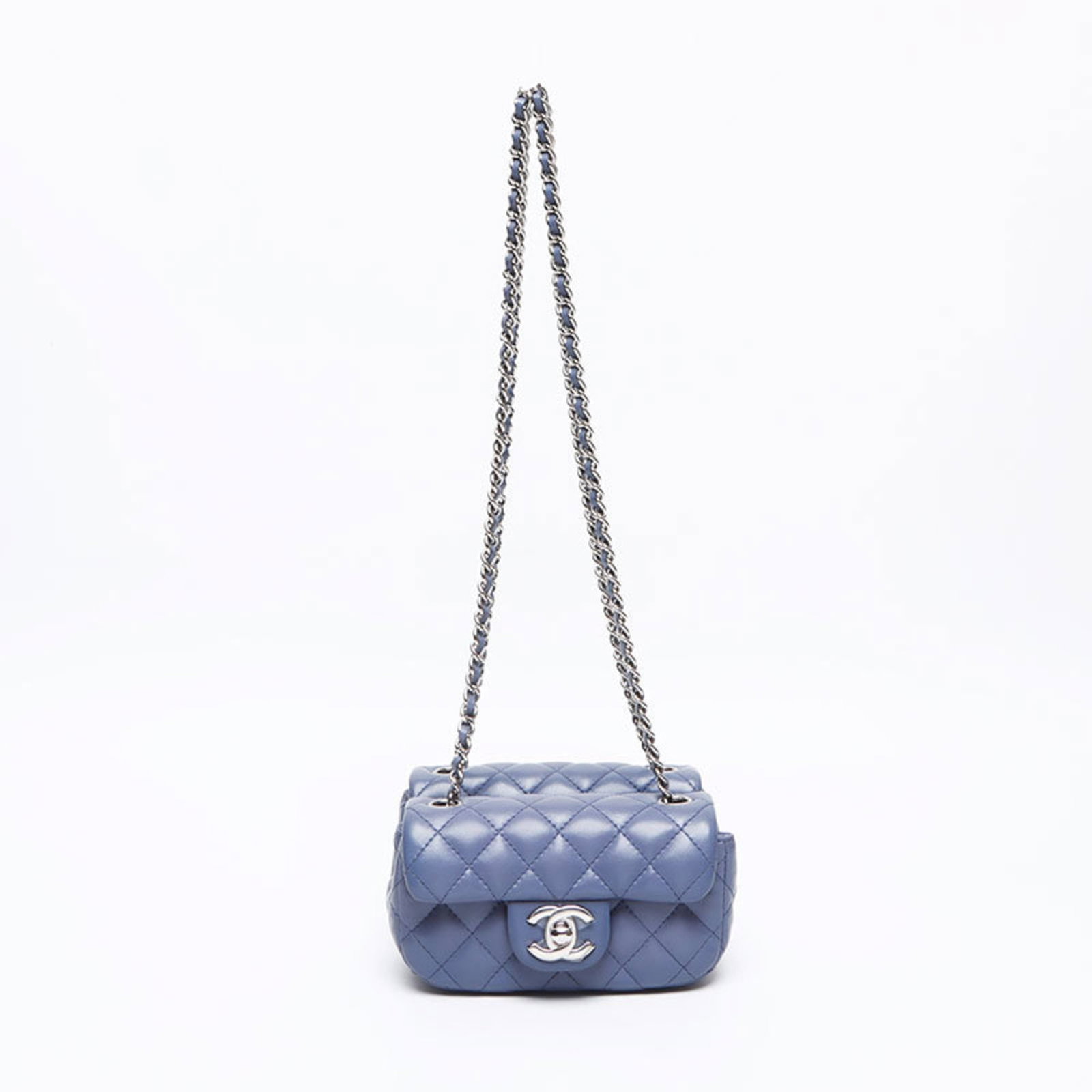 Shoulder Bag Leather Chanel: Shoulder Bag Leather Chanel This classic Chanel shoulder bag is crafted from luxurious lambskin leather in a stunning blue hue. Measuring just 9.5cm x 14.5cm x 5cm, it features a sleek design and adju