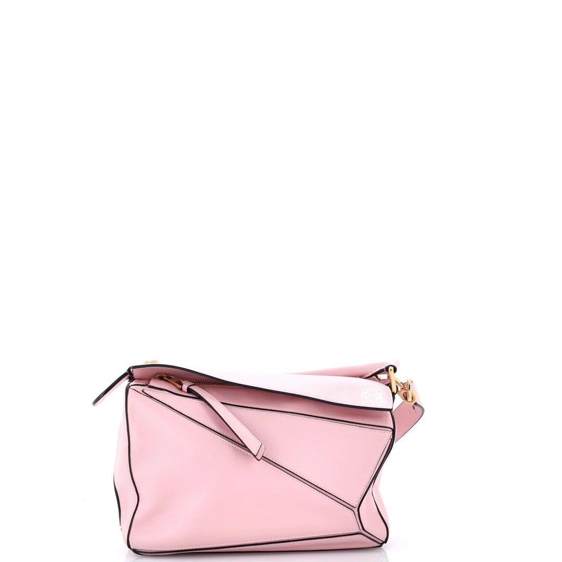 Small Leather Bag Puzzle Loewe: Small Leather Bag Puzzle Loewe Small Leather Bag Puzzle Loewe features a striking pink exterior and neutral interior, adorned with gold hardware. This small satchel boasts a classic design with minor