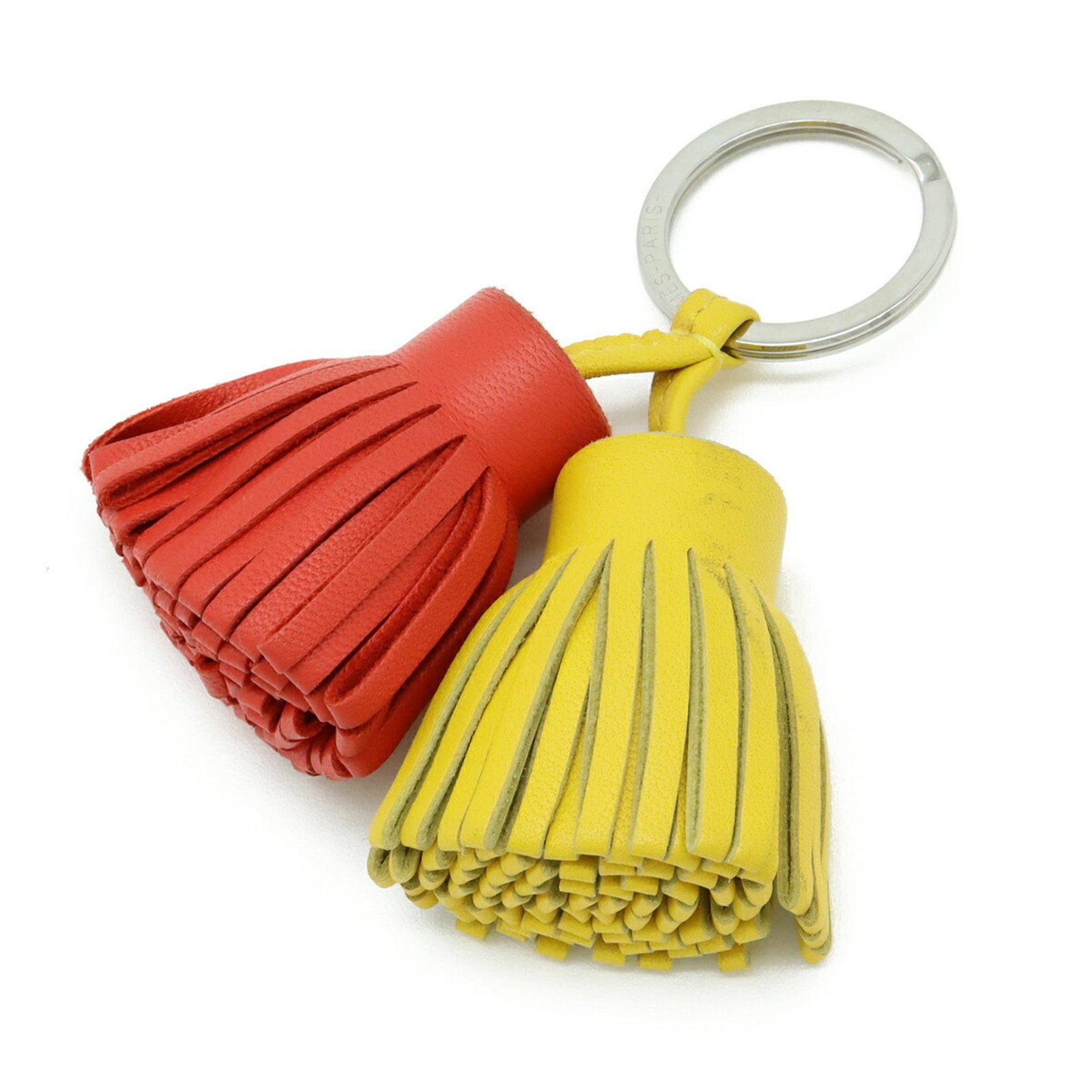 Milo Agneau Keyring Hermes: Milo Agneau Keyring Hermes Agneau Milo Keyring from Hermes features vibrant orange, red, and yellow hues. Made from high-quality Agneau Milo material, this keyring showcases the iconic brand's
