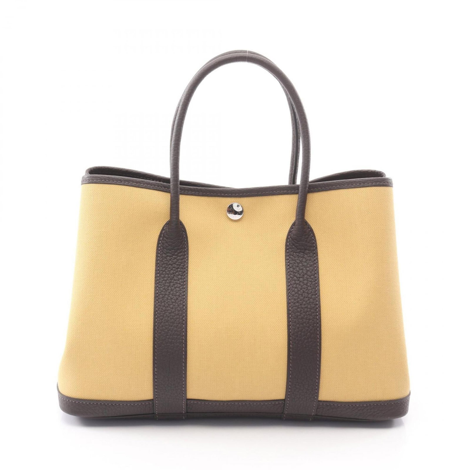 Canvas leather tote bag from Hermes: Canvas leather tote bag from Hermes Canvas leather tote bag from Hermes, featuring a classic design with a brown Ebene and yellow color combination. This stylish tote measures 21cm x 30cm x 14cm and