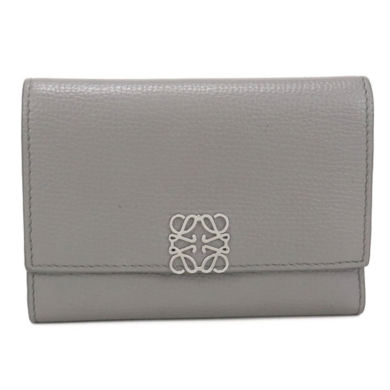 Loewe Wallet (Tri-Fold) Leather: Loewe Wallet (Tri-Fold) Leather The Tri-Fold Leather Wallet from Loewe boasts sleek, modern design with a sophisticated gray color. Made from high-quality calfskin leather, its tri-fold structure