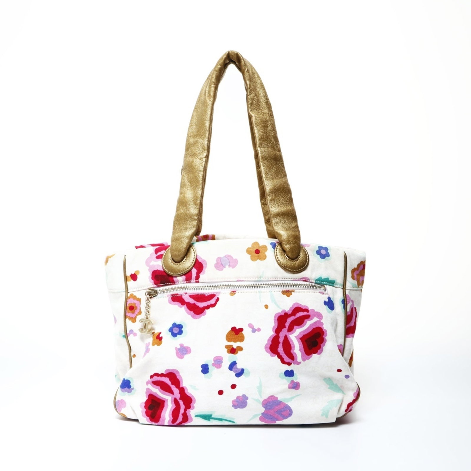 Canvas tote bag by Chanel: Canvas tote bag by Chanel Canvas tote bag by Chanel, featuring a multi-color design and sturdy canvas material. This stylish bag measures 25.5cm x 36cm x 10cm and has adjustable straps with a length