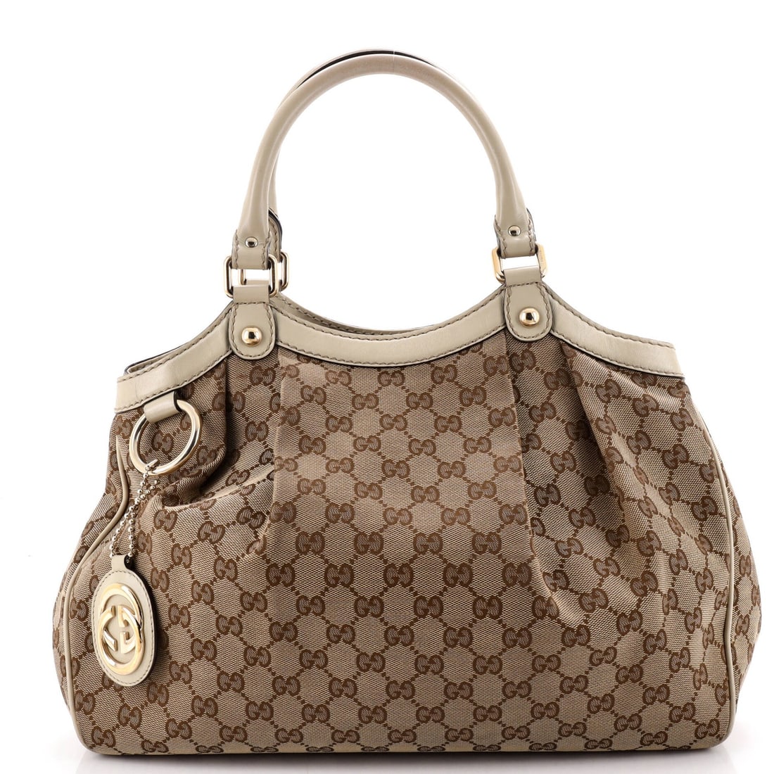 Gucci Sukey Tote GG Canvas with Leather Medium: Gucci Sukey Tote GG Canvas with Leather Medium The Gucci Sukey Tote GG Canvas with Leather Medium boasts a neutral brown exterior and gold tone hardware, adding a touch of sophistication to its