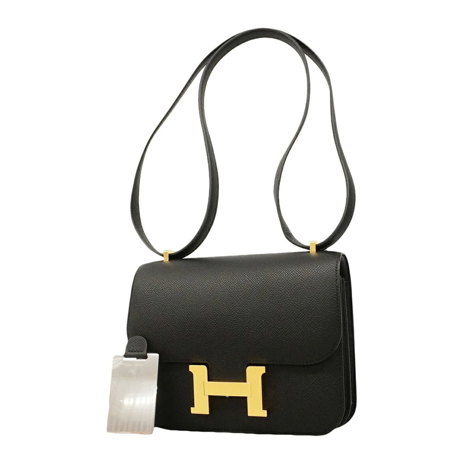 Shoulder bag leather by Hermes: Shoulder bag leather by Hermes This black Epsom leather shoulder bag from Hermes features sleek gold hardware and timeless design. Made from high-quality leather, its compact size makes it perfect for